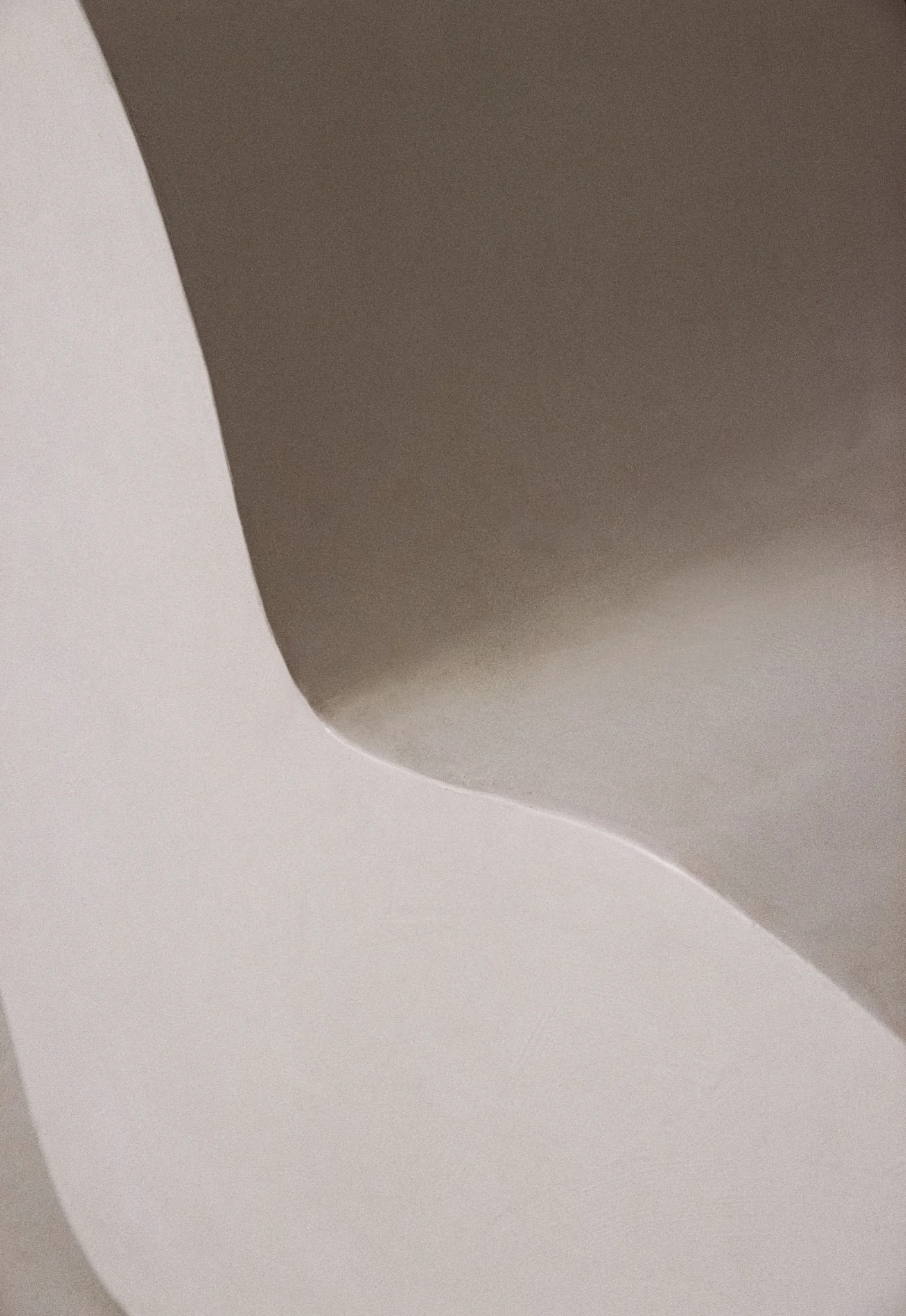 Mawjé Chair ITS A MOOD curved silhouette with base opening detail