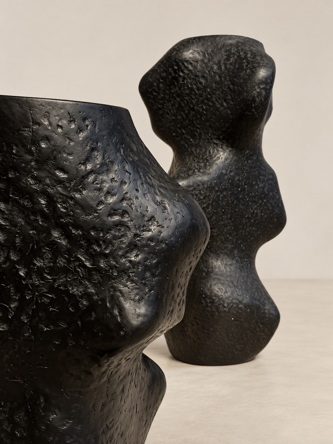 Pedestal III by Justino Del Casar, tall biomorphic sculpture in recycled paper