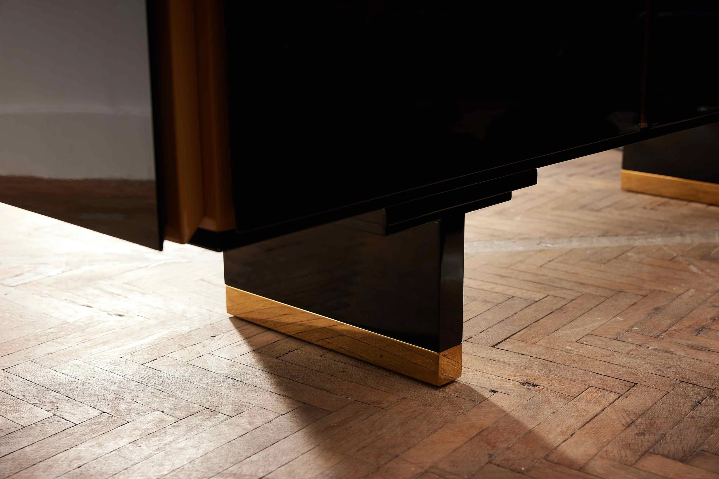 Sculptural storage cabinet featuring rhythmic geometric planes by ARTEMPO.