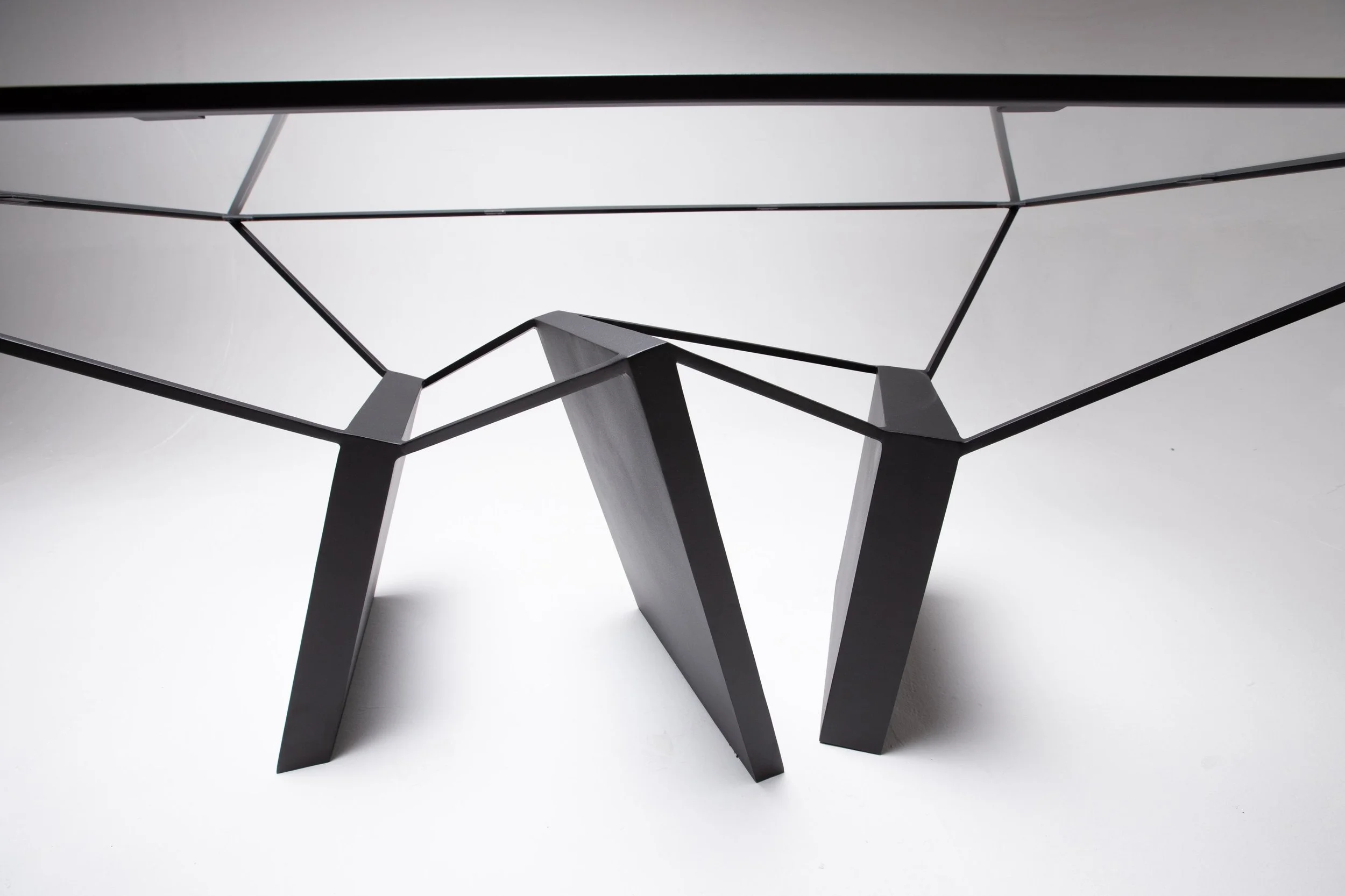 Minimal steel structure table Ripple Effect at EAST WEST SPACE — contemporary furniture.