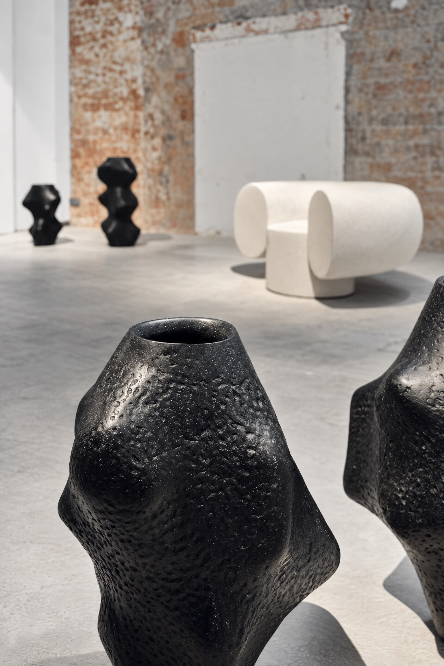blanconegro-barcelona-dark-textured-vessel-sculptures.jpg