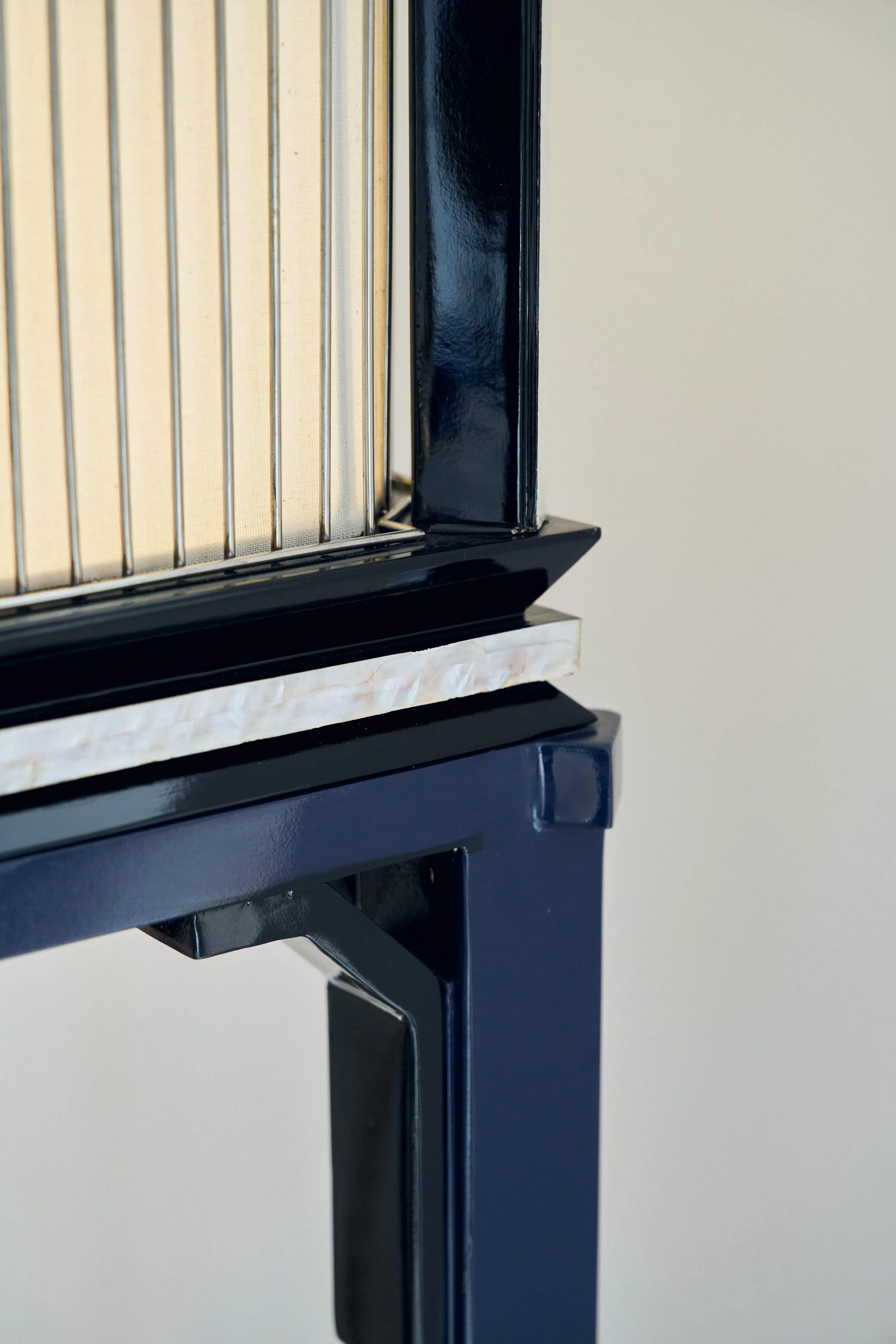 Collectible design lighting piece combining craftsmanship and contemporary form