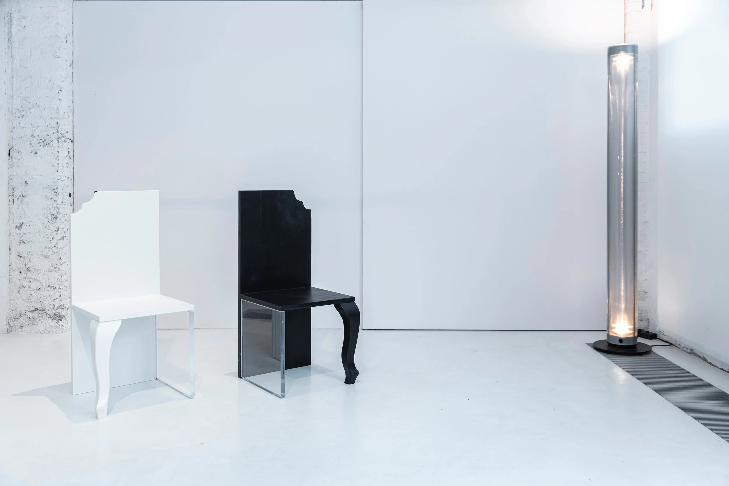 Contemporary sculptural chair Enigma 002 in black finish at EAST WEST SPACE showroom.