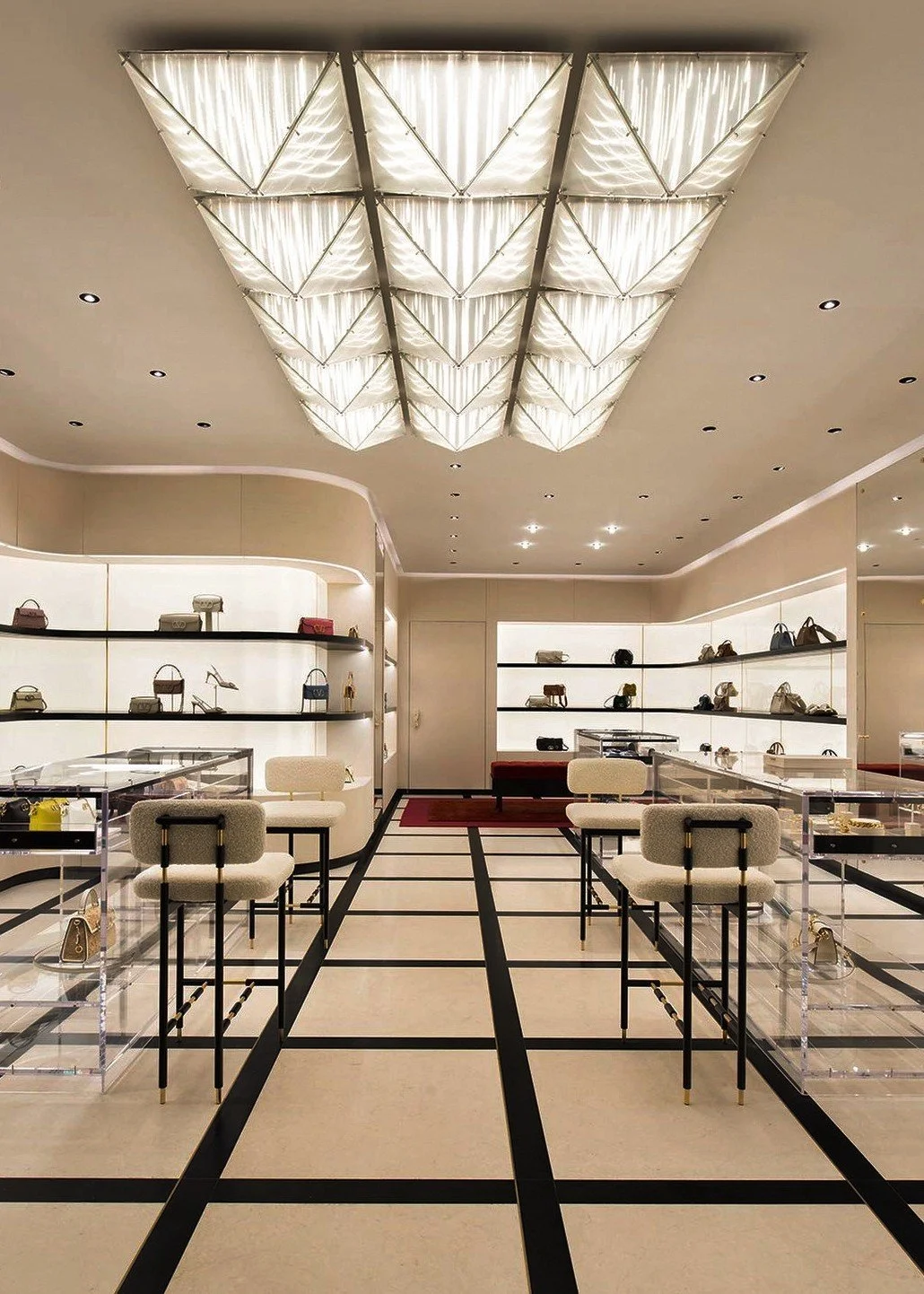 Sculptural lighting piece by Sing Chan featuring prismatic translucent elements.