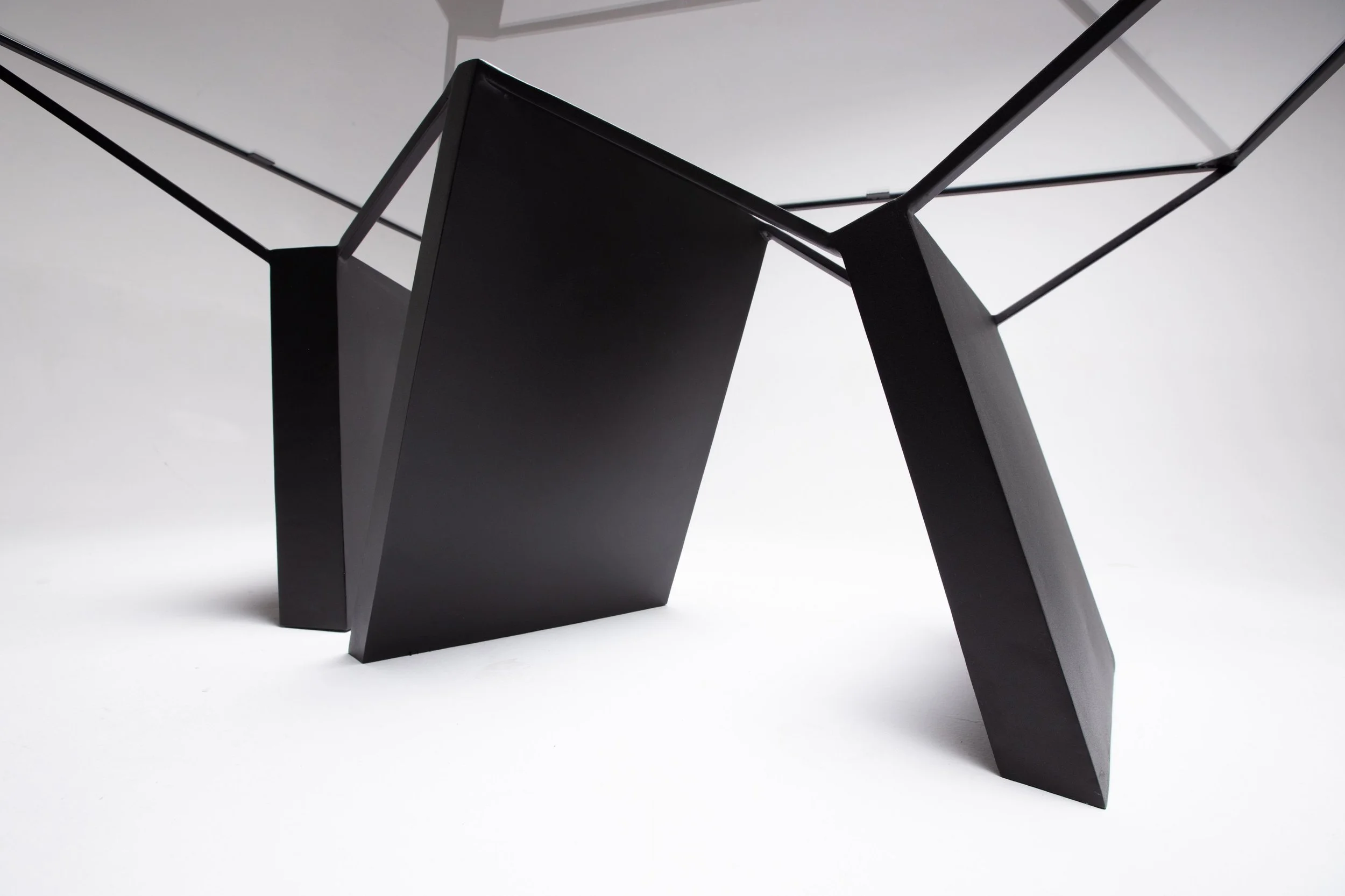 Black steel collectible design table Ripple Effect by Nissa Kinzhalina — EAST WEST SPACE.