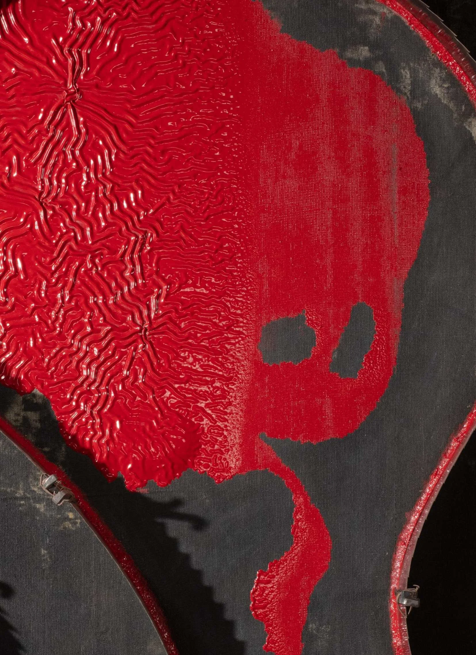 Sculptural cashew lacquer piece in red and black tones