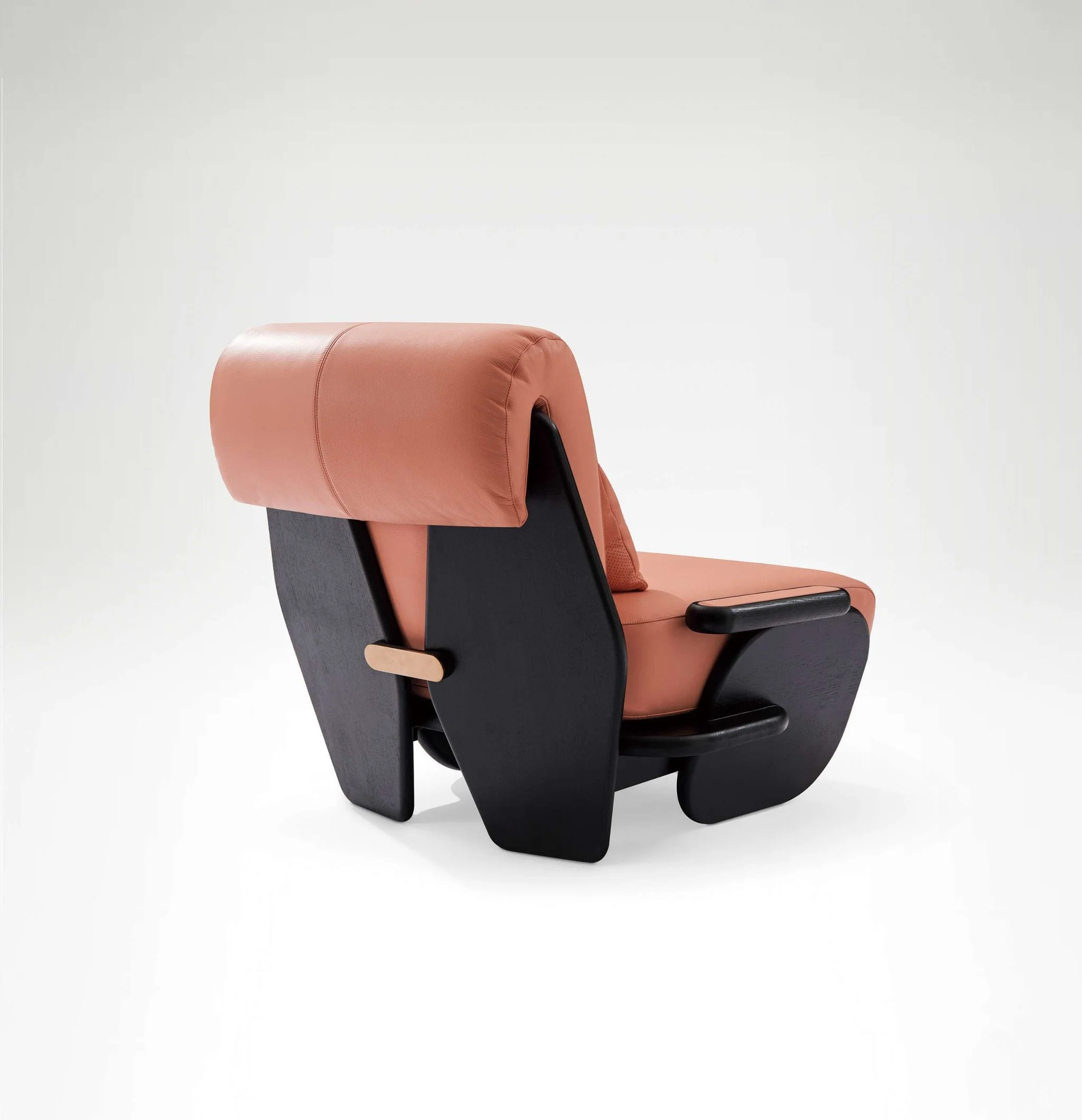 Contemporary collectible lounge chair inspired by organic ladybug-like form.