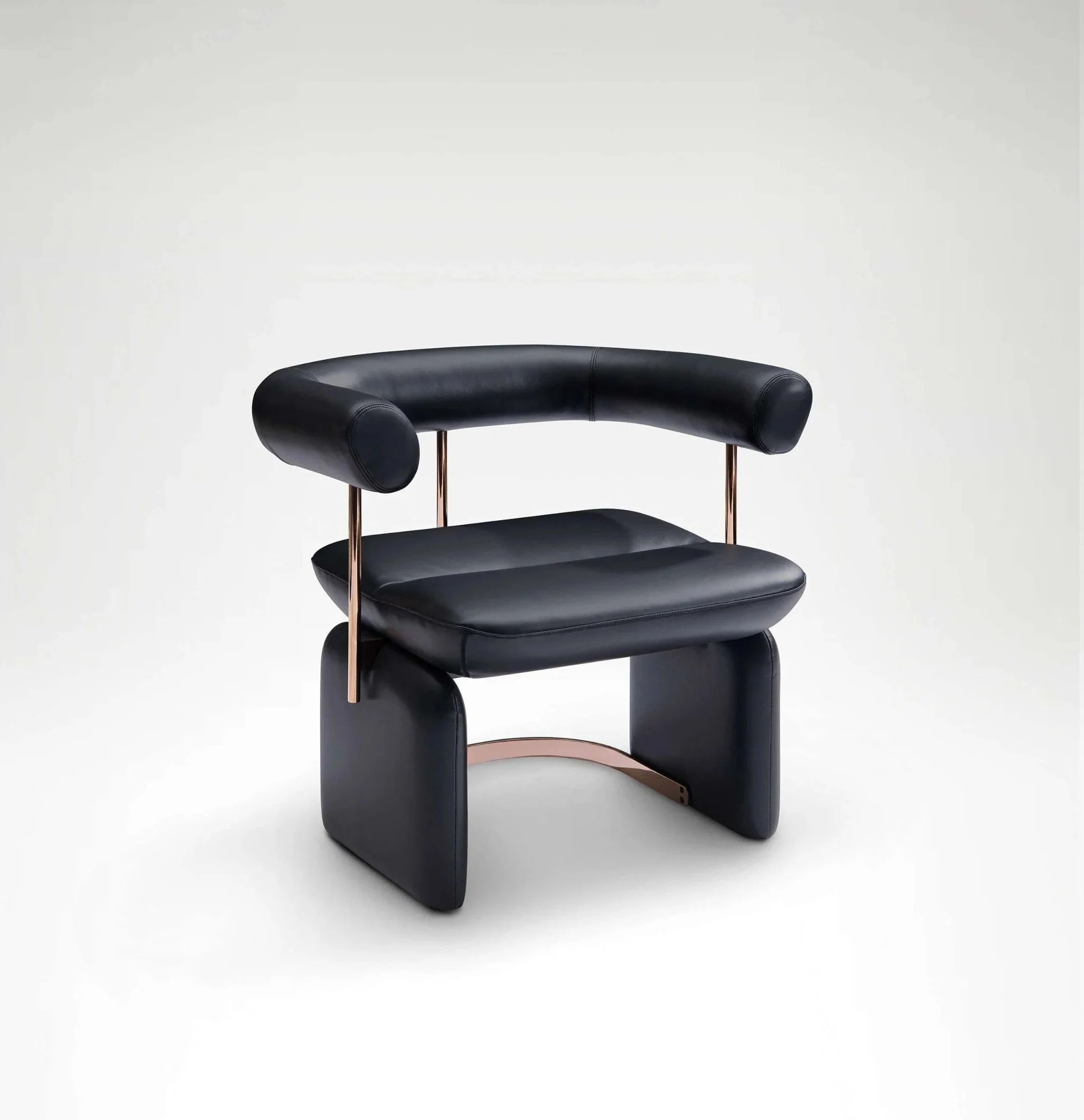 Black leather chair featuring petal-like divisions and elegant curved lines.