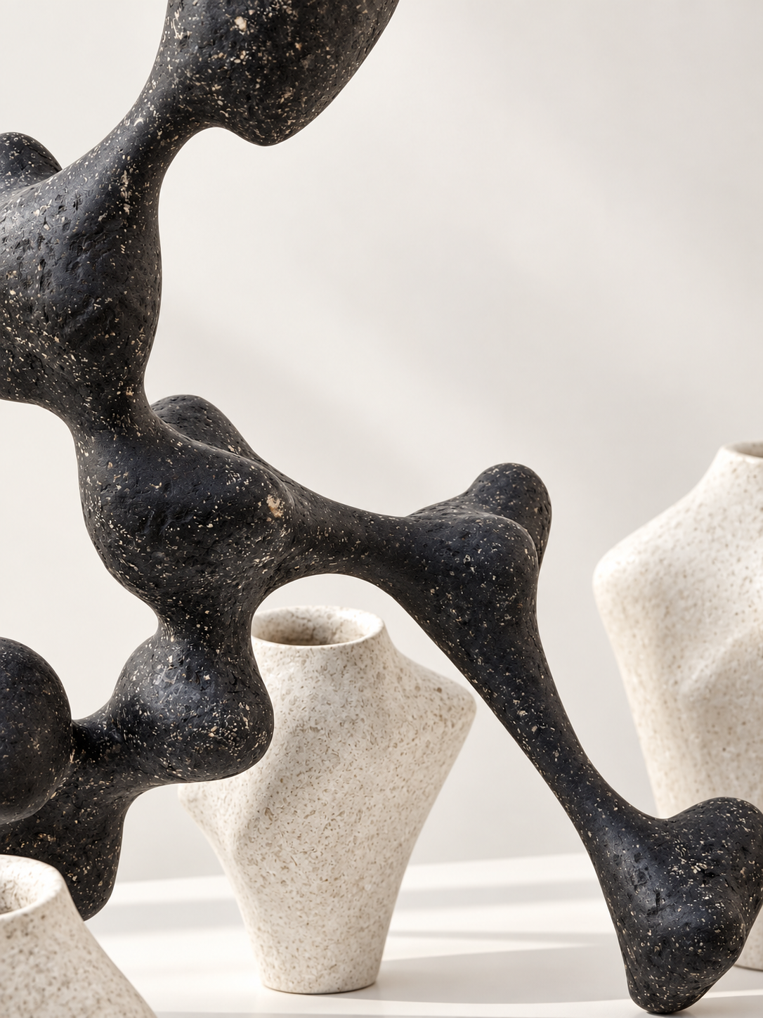 Profile view of Bicho II by Justino Del Casar, sculpture made from recycled lottery ticket paper pulp