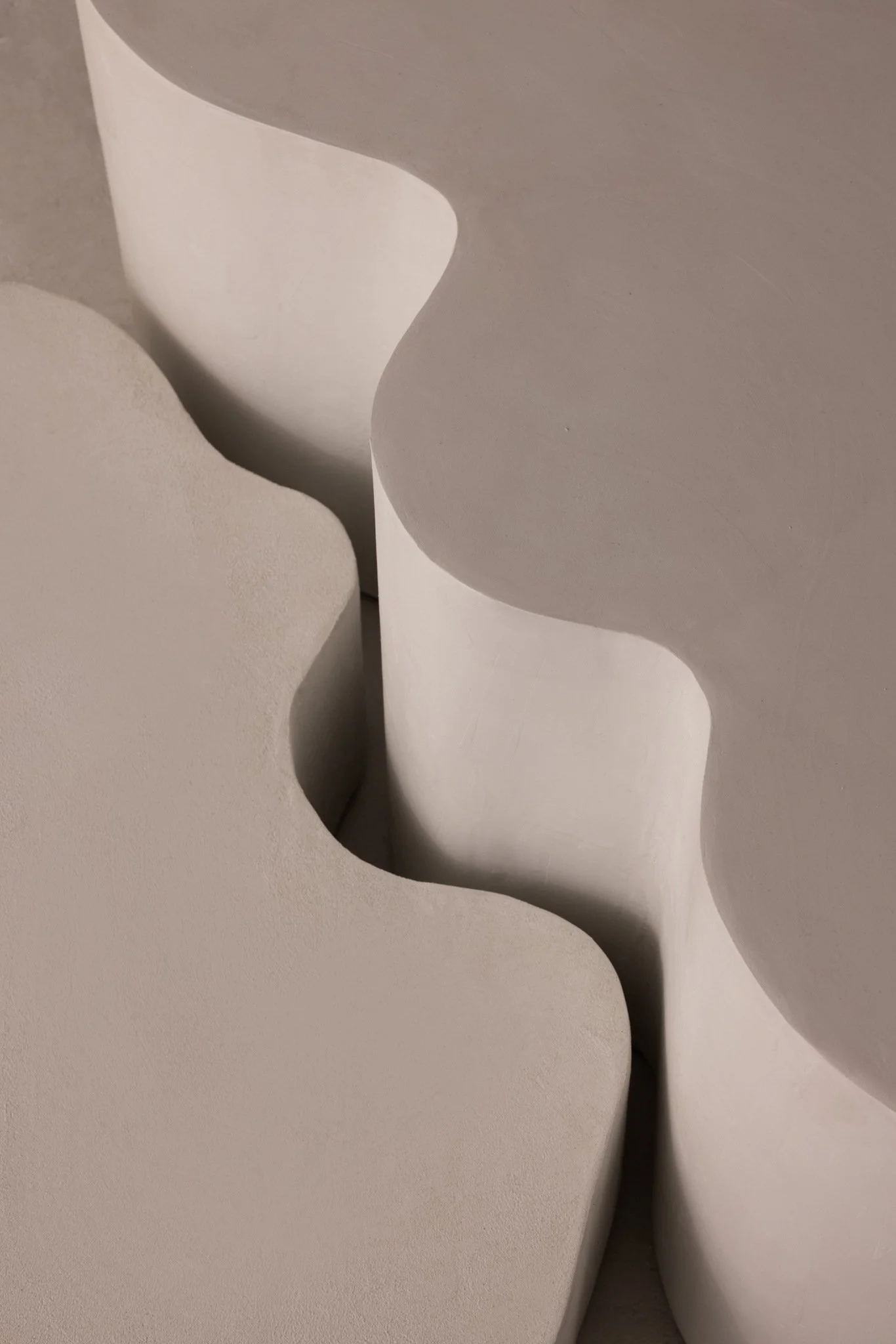 Handcrafted sculptural seating with tactile surface created for curated residential interiors