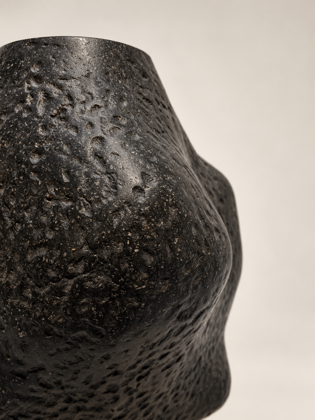 Charta Ollam by Justino Del Casar beside a second vessel from the series, biomorphic black paper sculptures