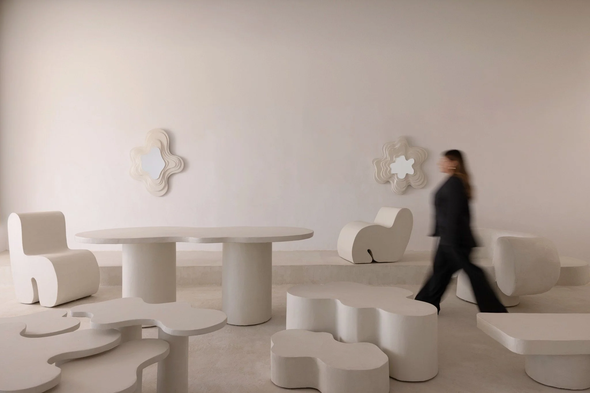 Handcrafted sculptural chair in microcement designed for contemporary interiors and collectible spaces designer by ITS A MOOD