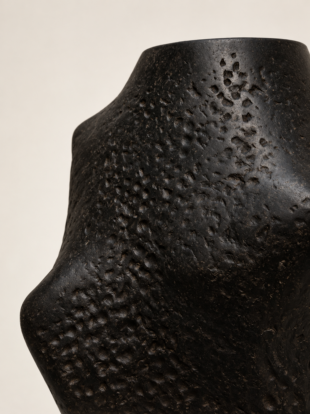 Pitted, volcanic-like texture of Charta Ollam, recycled paper sculpture by Justino Del Casar