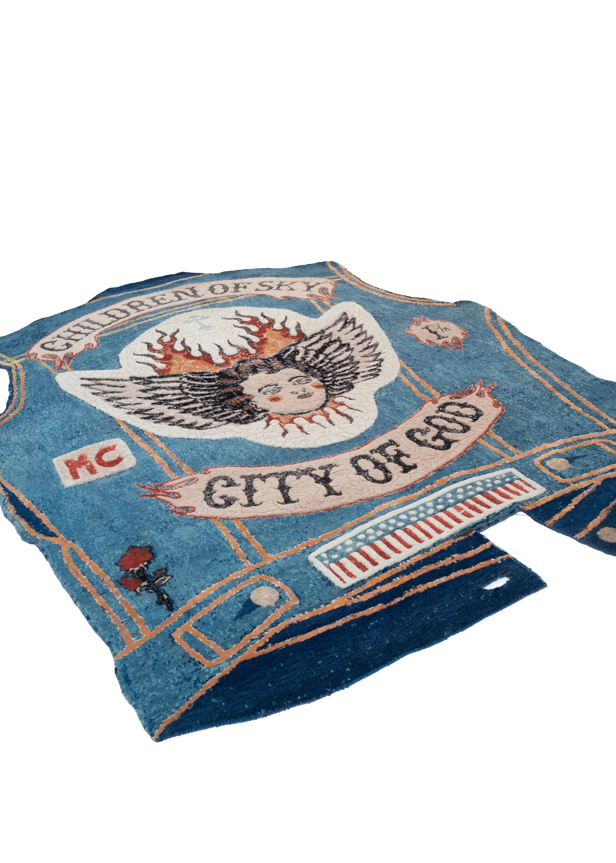 Shaped hand-knotted rug Children of Sky by Julien Jaca: indigo denim vest with winged cherub, City of God banner and stars-and-stripes badge