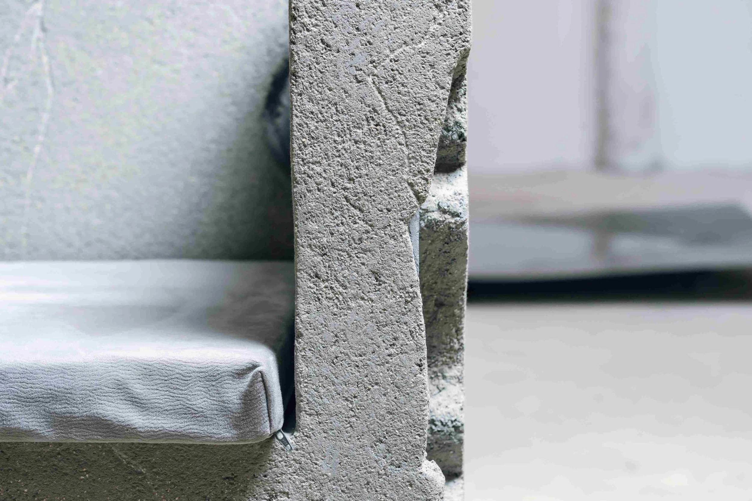 Sculptural armchair Monolithe by Minimal Studio displayed at EAST WEST SPACE collectible design showroom, contemporary furniture