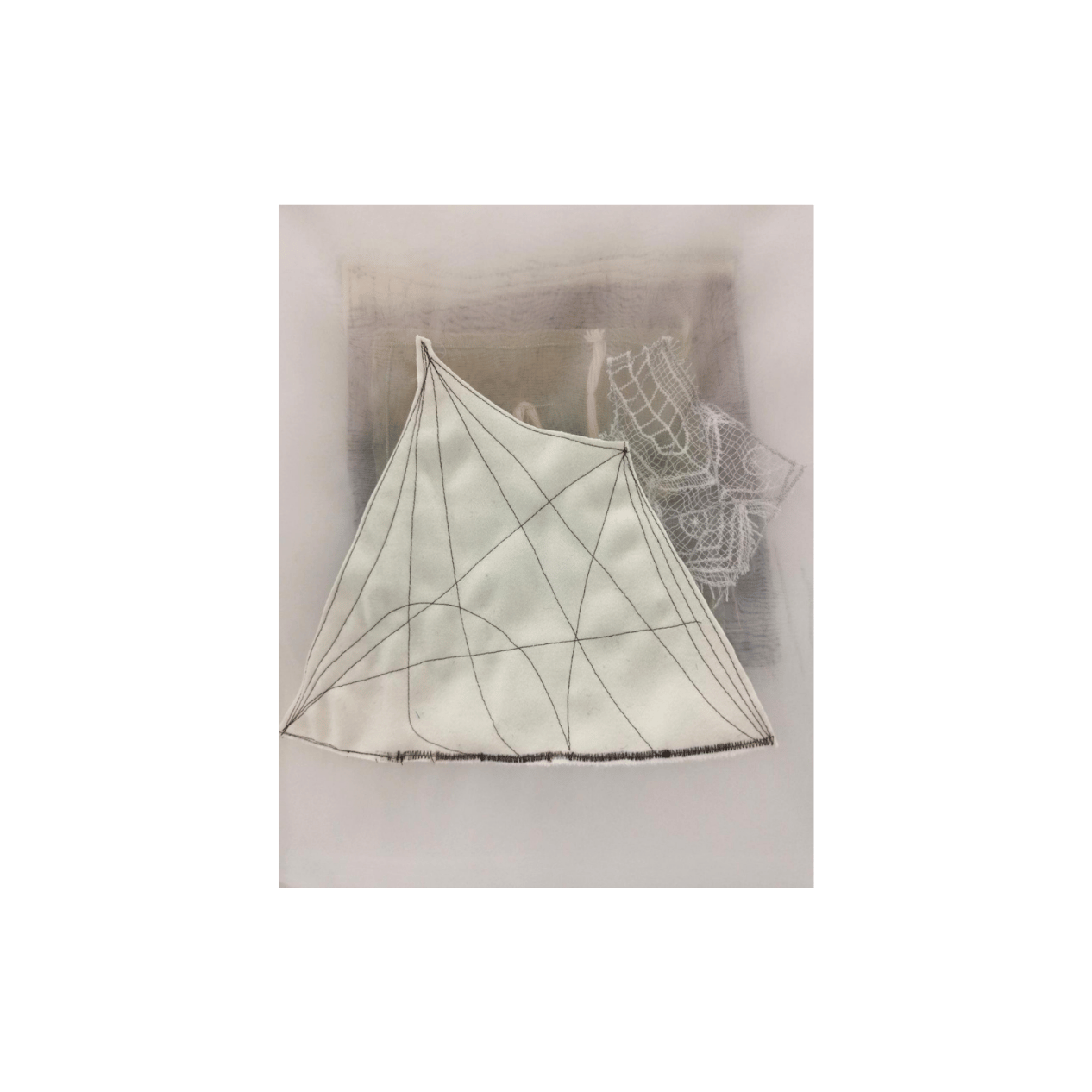 Contemporary textile artwork with layered fabrics, hand-stitched geometric lines and soft translucency exhibited at EAST WEST SPACE in Barcelona
