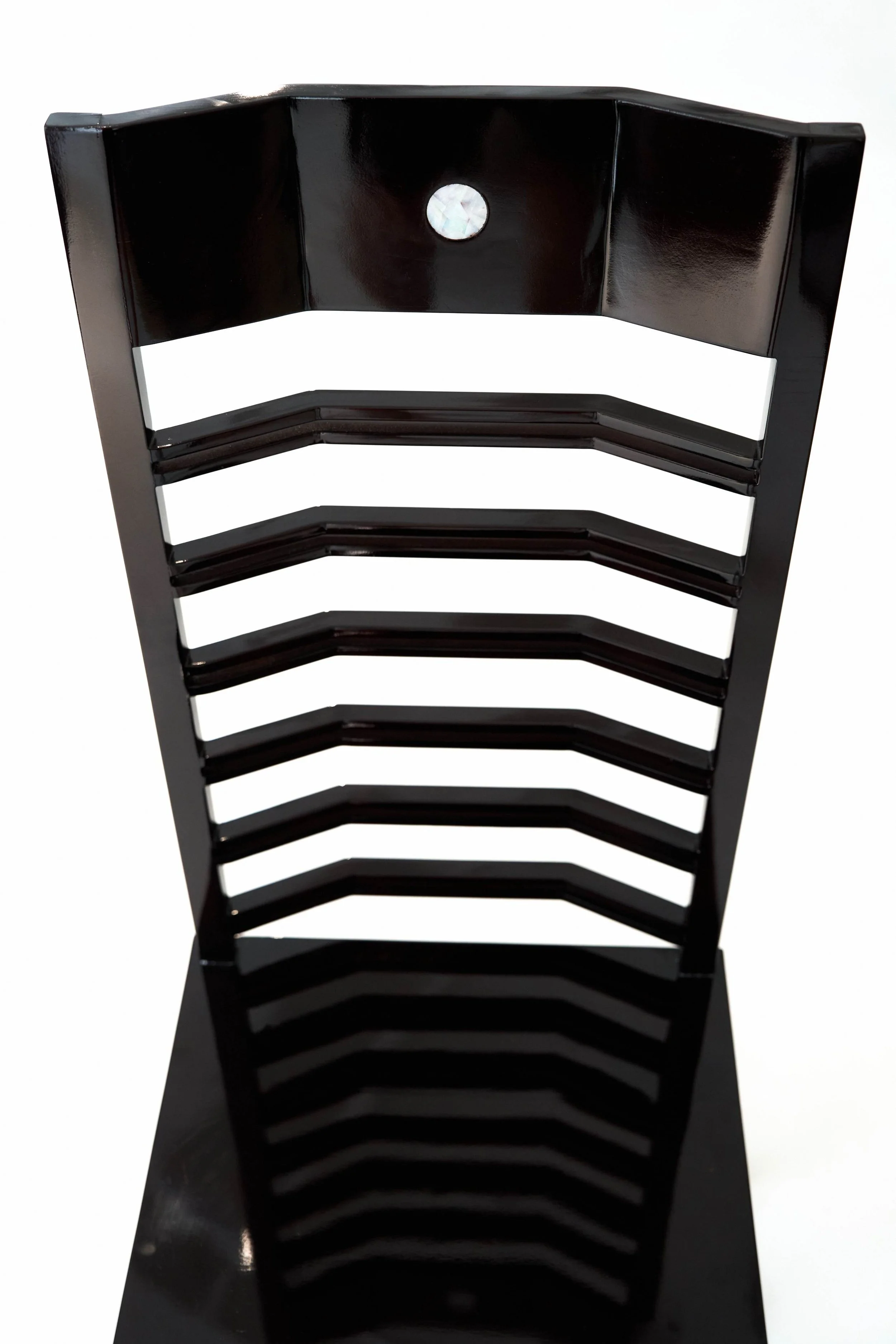 Sleek black lacquered chair blending tradition and innovation, ARTEMPO design.