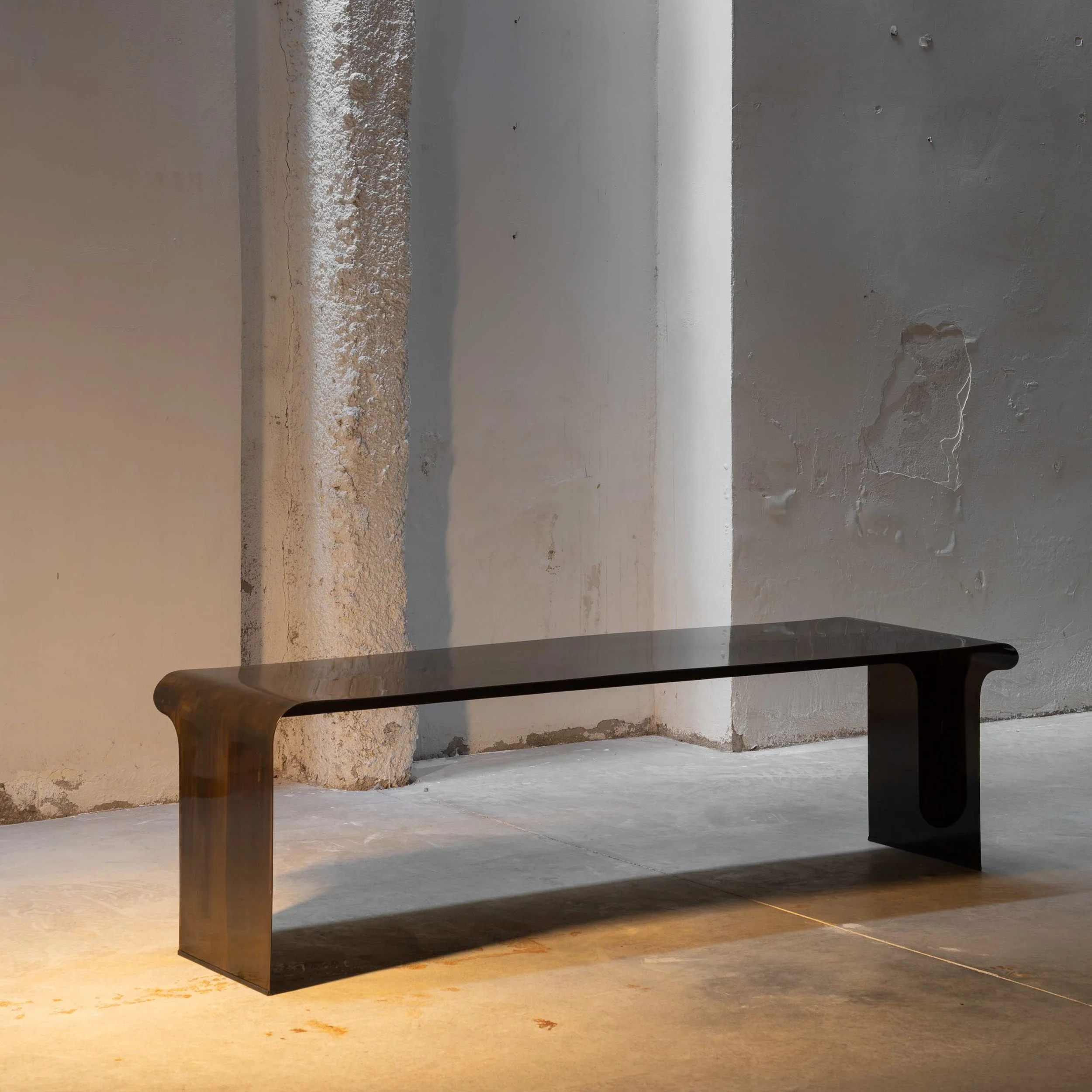 Minimalist bench in dark patinated metal by Maxime Halot, contemporary collectible design