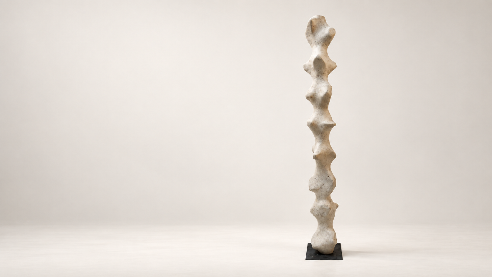 Tall organic recycled paper sculpture by Justino Del Casar on a black metal base, available on BLANCONEGRO Barcelona