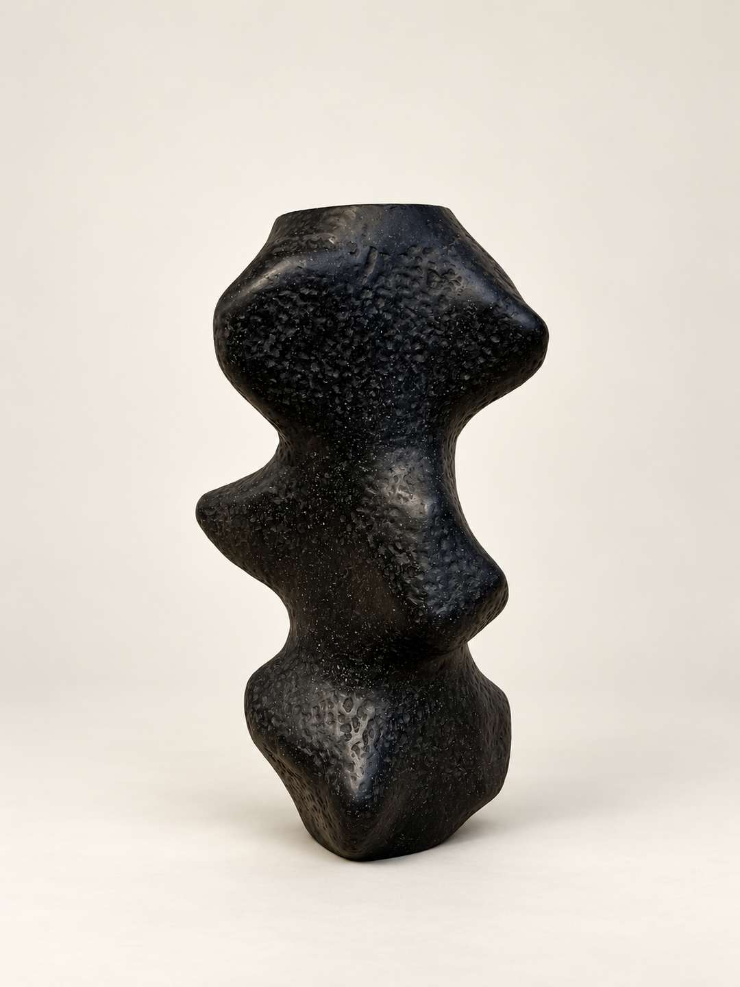 Organic black sculptural pedestal Pedestal III by Justino Del Casar, side view