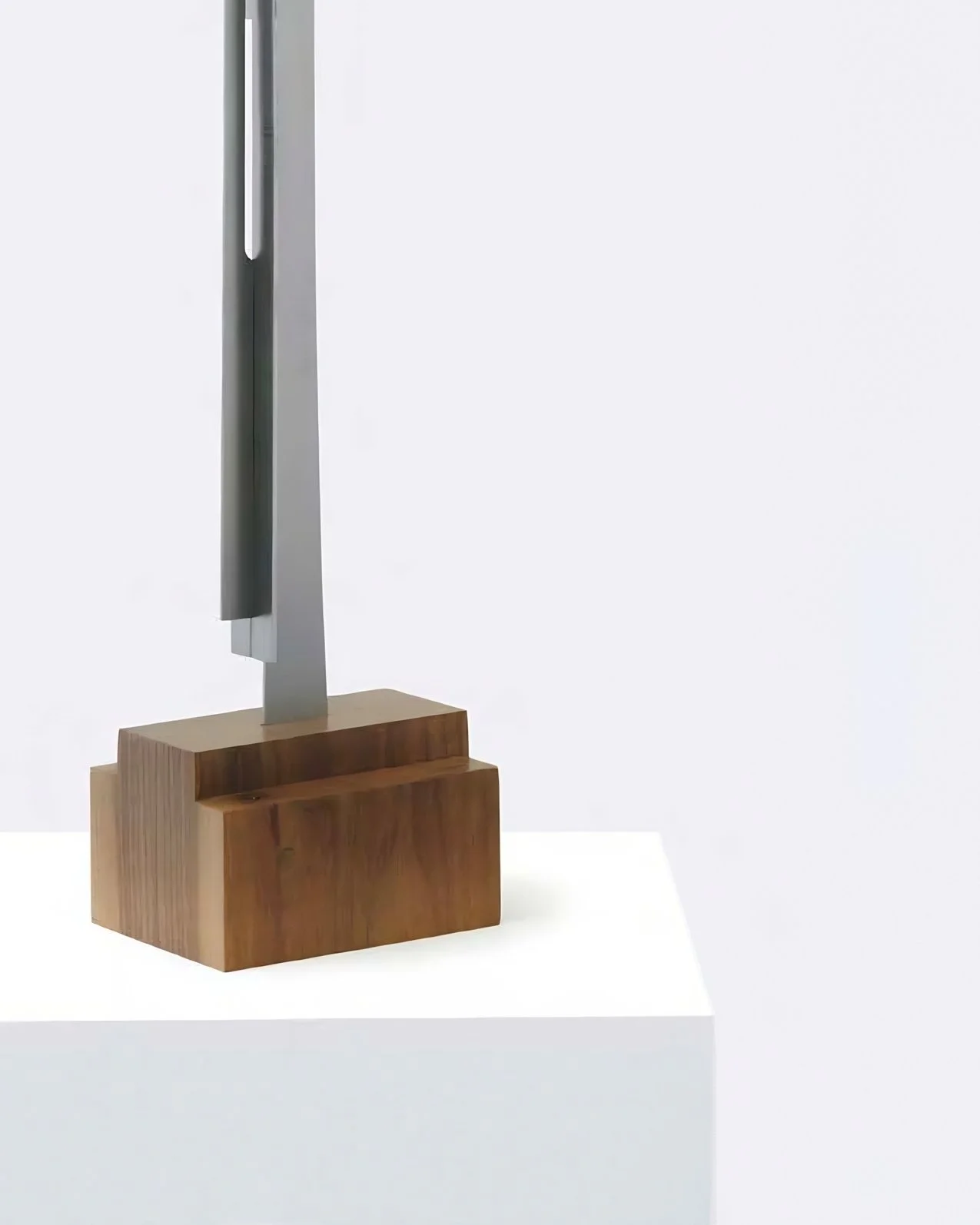 Indoor and outdoor steel totem sculpture with warm wooden foundation, Composition Totem N5.