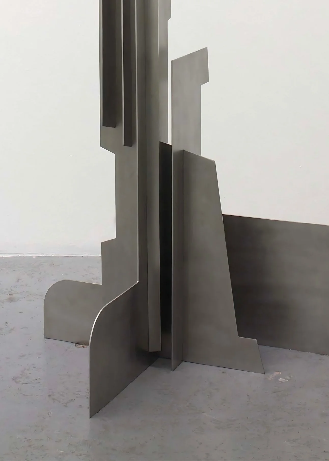 Collectible design sculpture in brushed steel, for outdoor and indoor luxury spaces