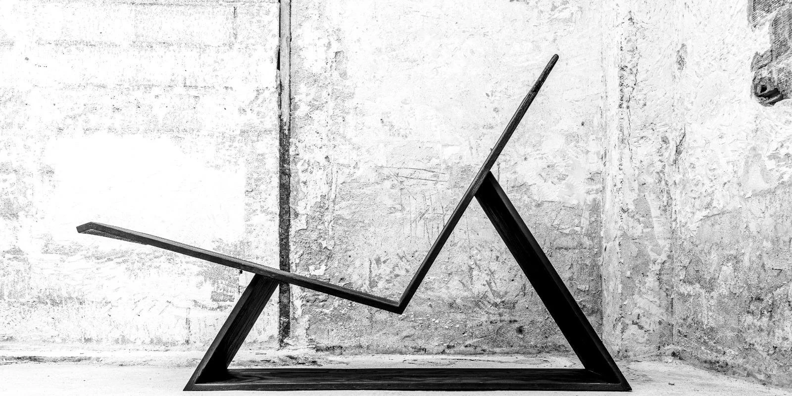 Collectible design lounge chair Chloe by Minimal Studio with angular sculptural form