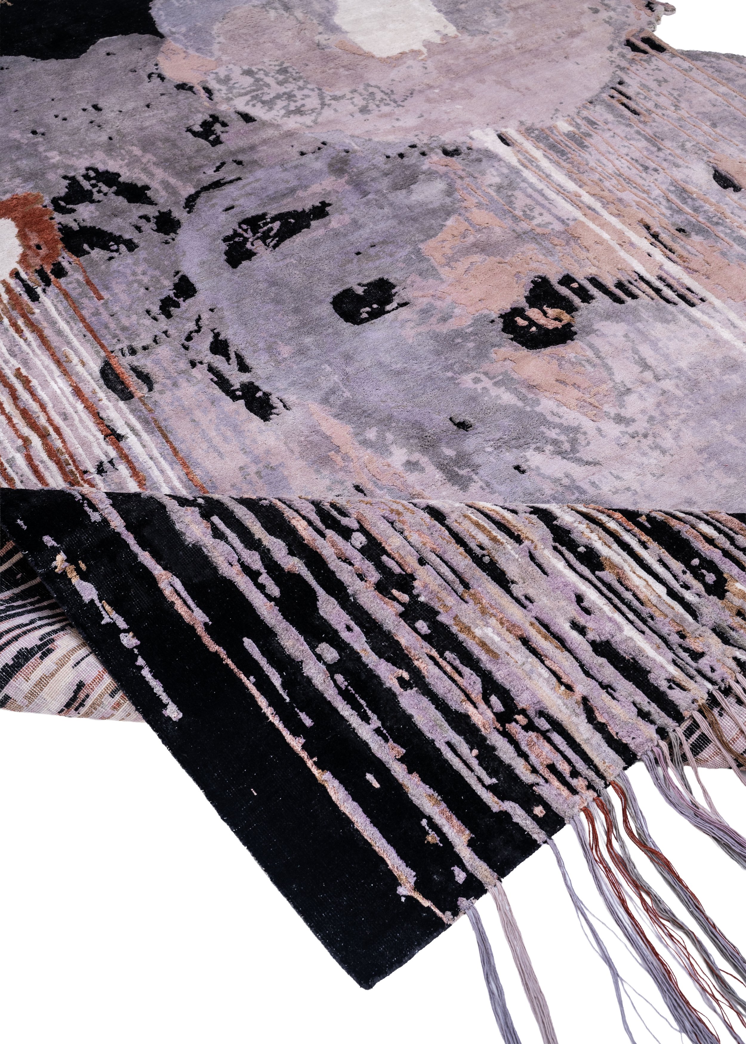 Close-up of the carved pile of Sugar Magnolia by Julien Jaca: wool and silk in lilac, blush, rust and black, Dinodo Studio art rug