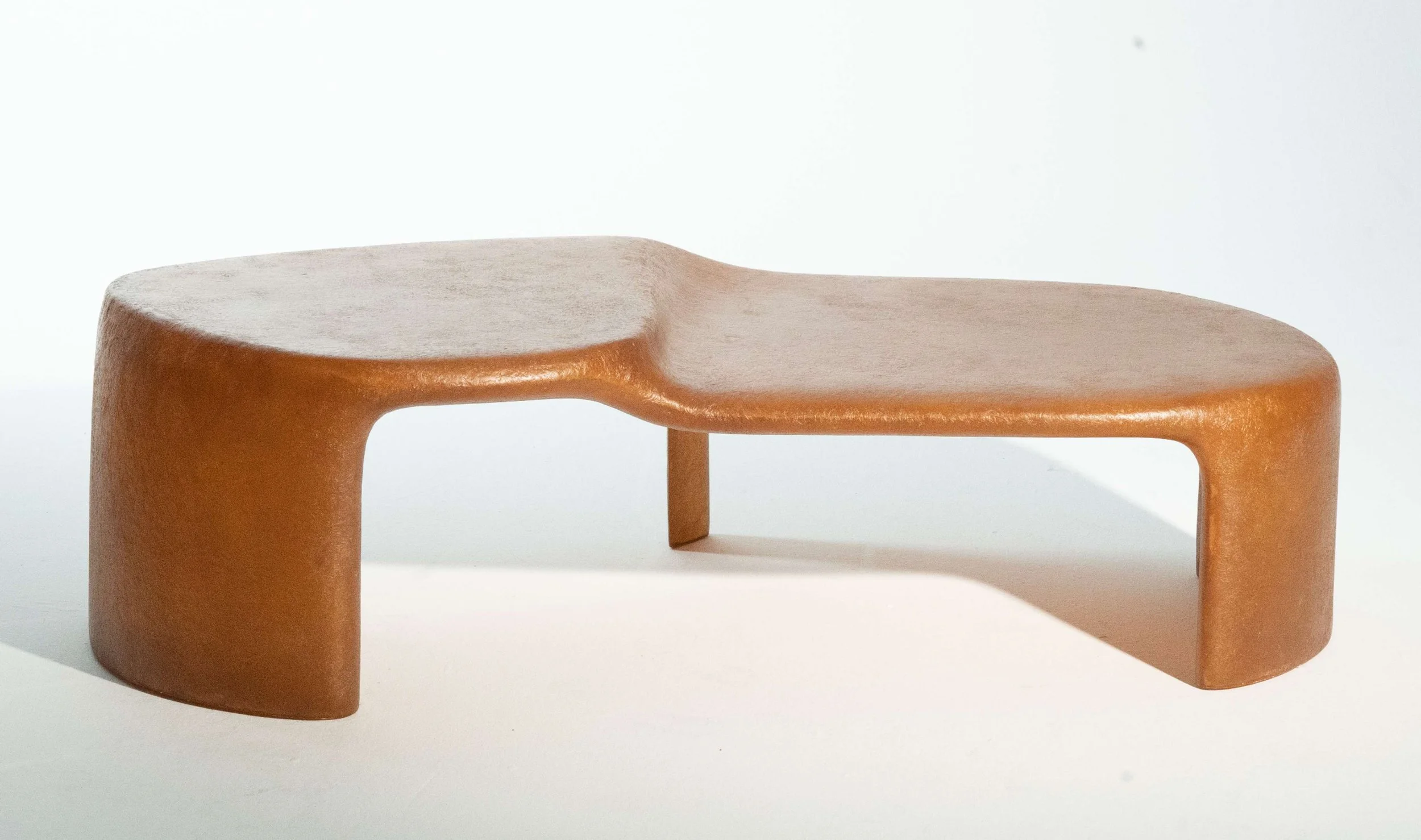Signature Contour Tea Table with soft organic form by Carlos Chen at EAST WEST SPACE