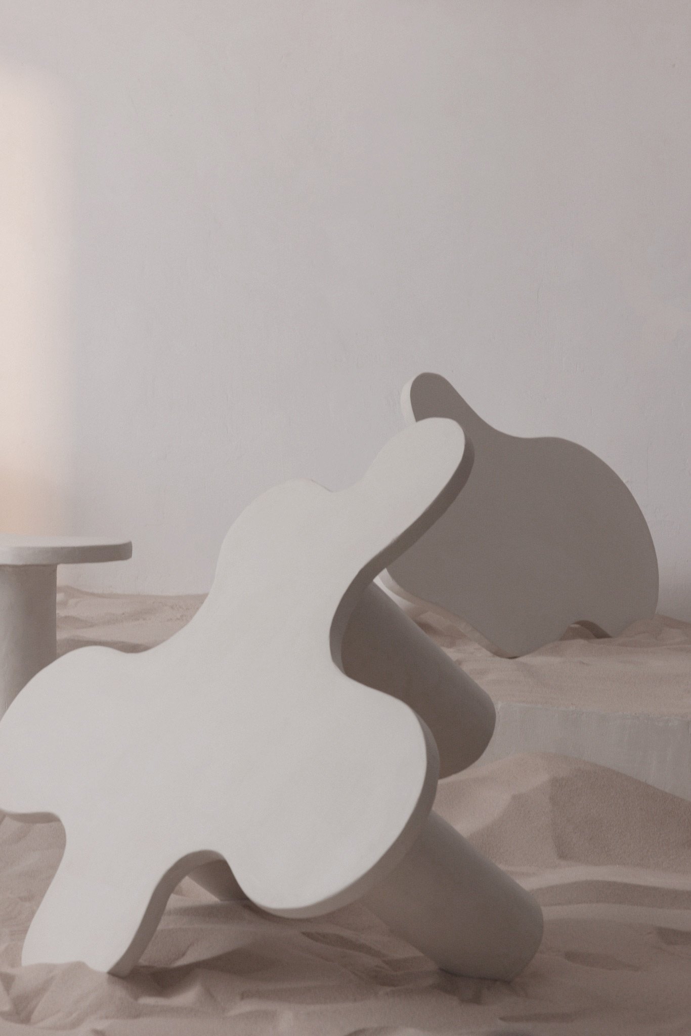 Sculptural tables design with flowing form created for curated interior architecture projects by ITS A MOOD