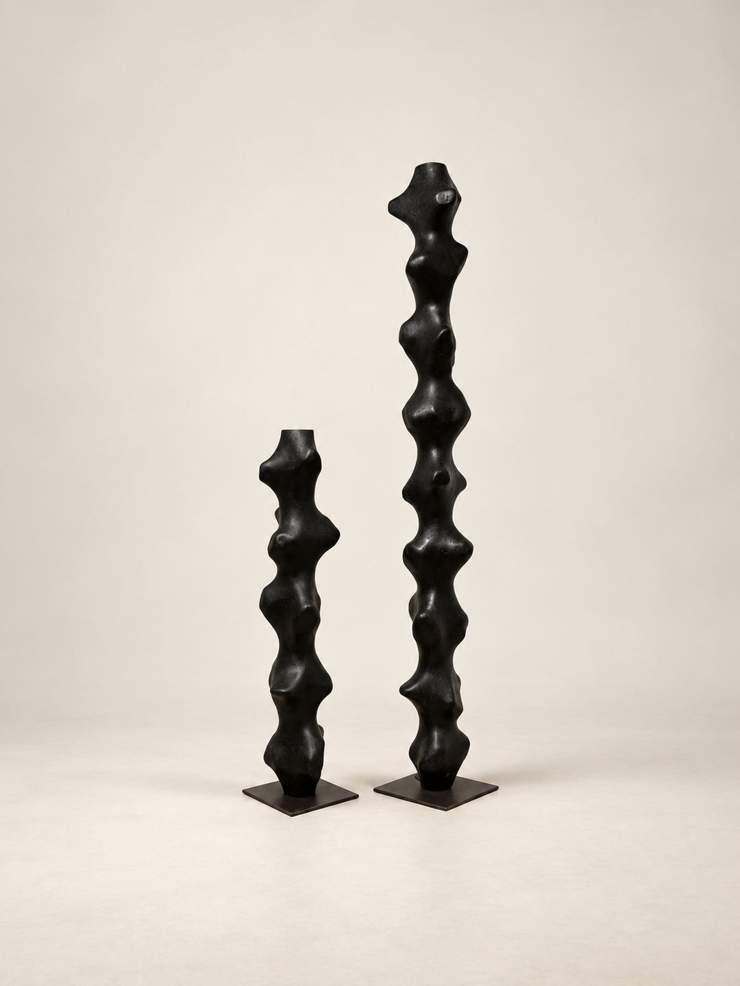 Tótem I and Tótem II by Justino Del Casar, pair of black totem sculptures, collectible design at BLANCONEGRO BARCELONA