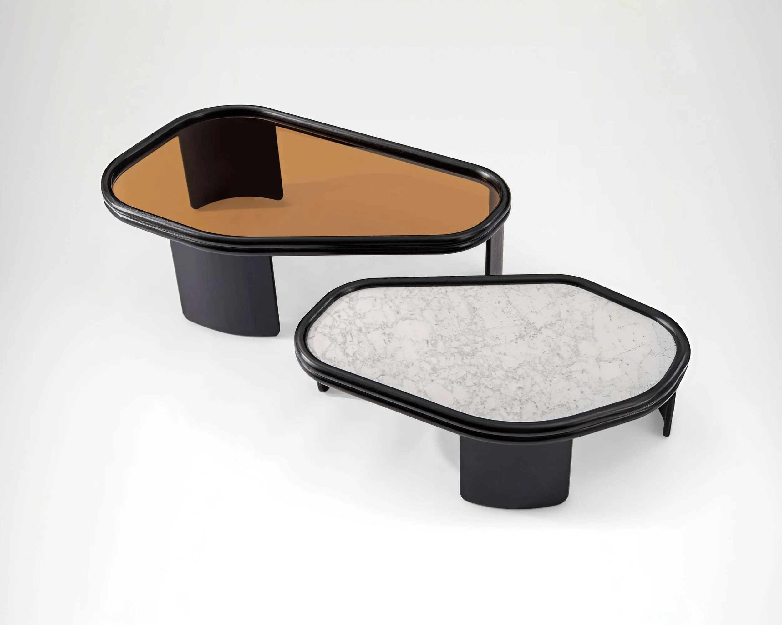 Collectible side table featuring organic soft-edged design in dark wood.