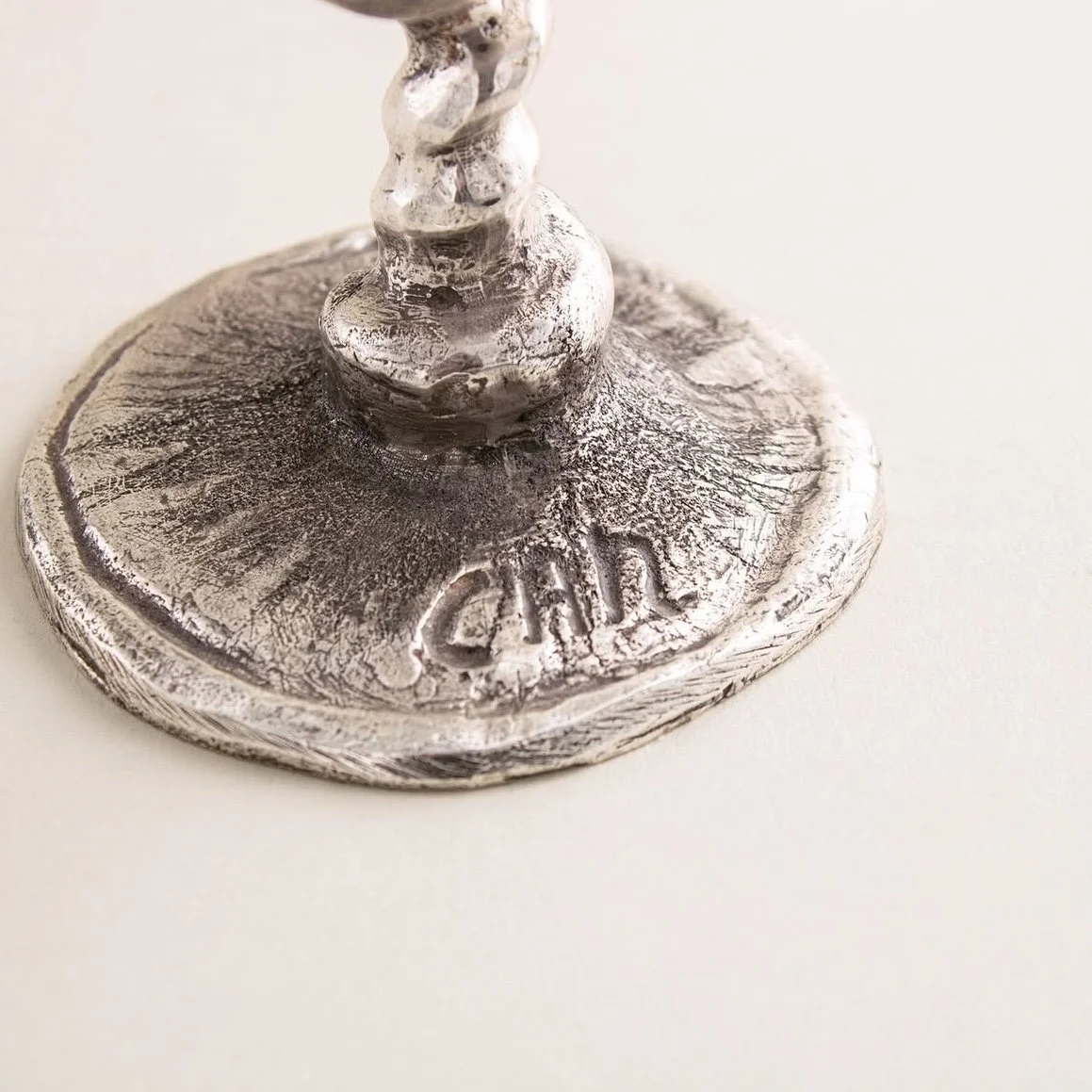 Corry Ammerlaan collectible candle holder set with sculptural textured metal forms