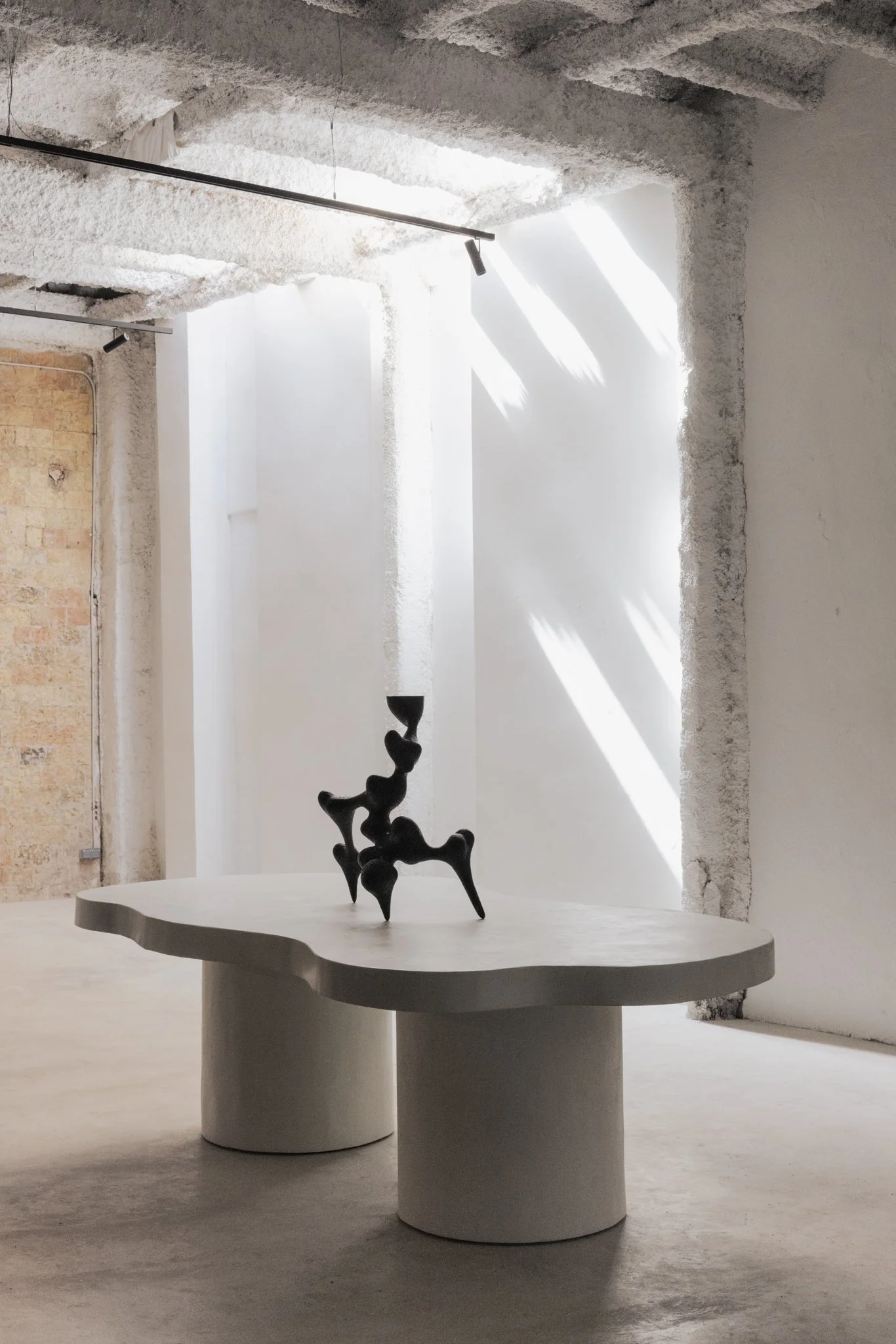 Curvae Table by ITS A MOOD, biomorphic pedestal table with soft curved top in matte greige, BLANCONEGRO BARCELONA