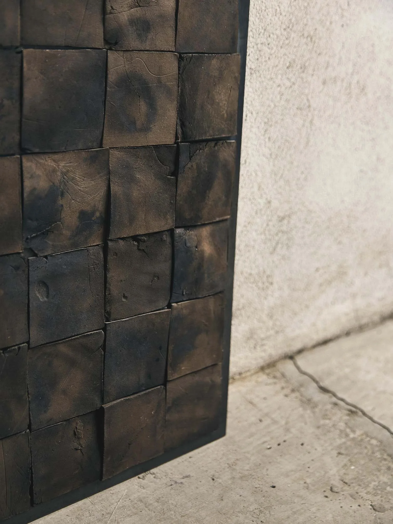 Textured ceramic wall sculpture Earth 2.10 by Yoyo Balagué at EAST WEST SPACE