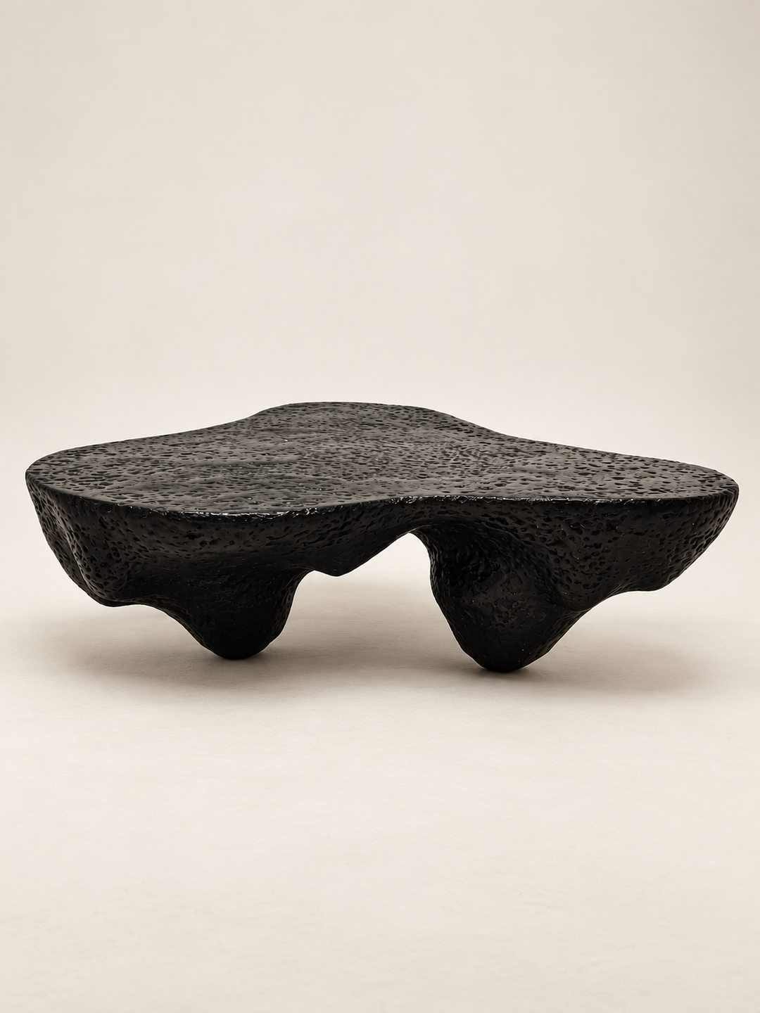 Brutalist organic coffee table Insula by Justino Del Casar, sustainable collectible design, BLANCONEGRO BARCELONA