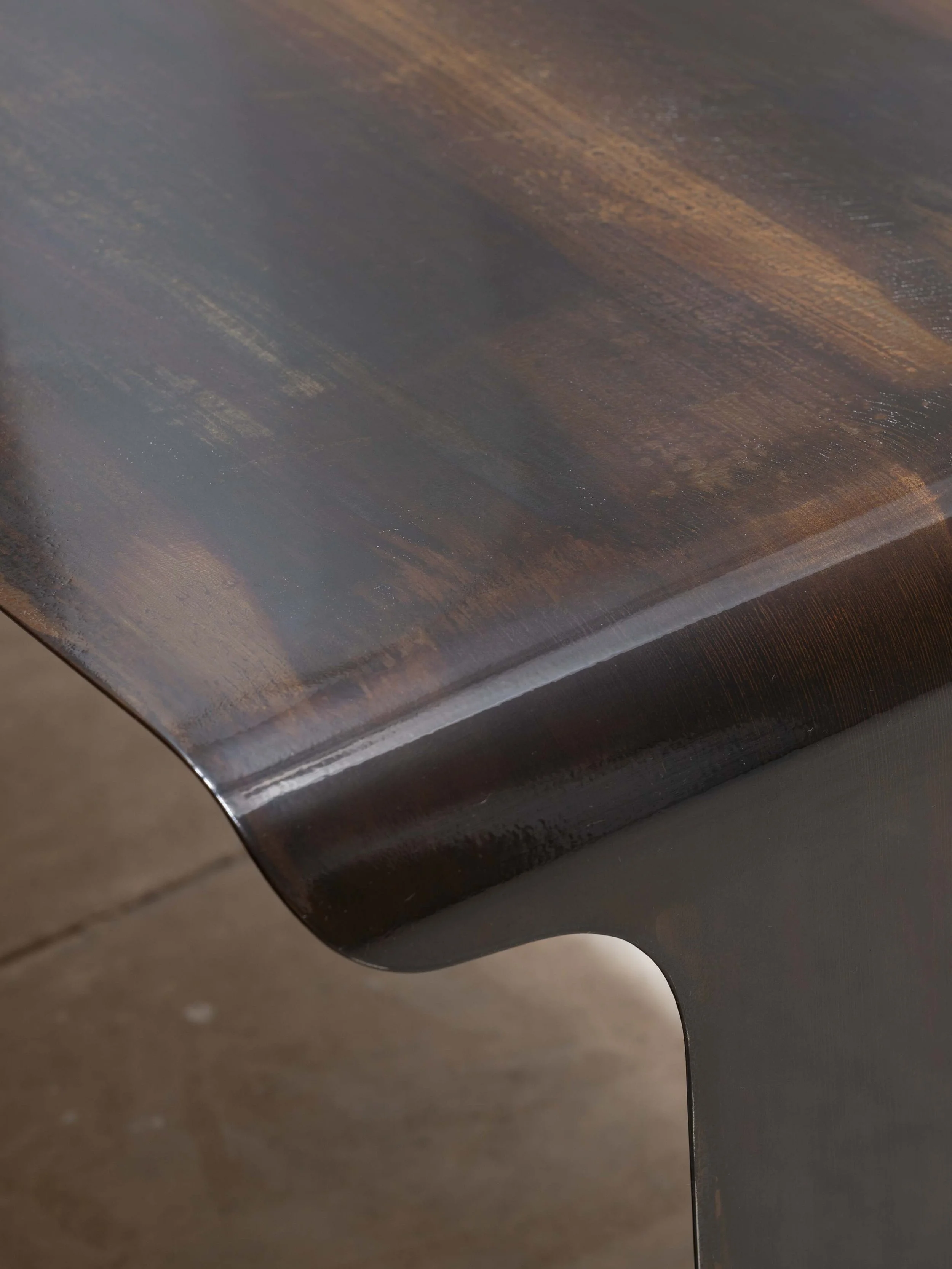 Modern sculptural bench in dark patina, luxury interior furniture by Maxime Halot