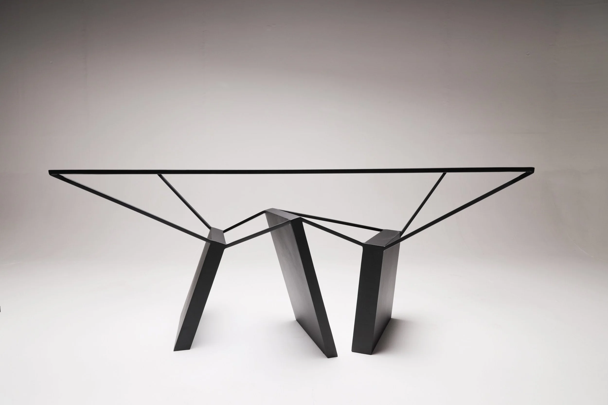 Contemporary steel geometric table by Nissa Kinzhalina, Ripple Effect at EAST WEST SPACE.
