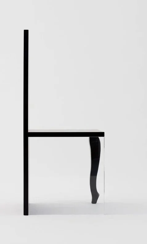 Unique collectible design chair Enigma 002 with sculptural silhouette, EAST WEST SPACE showroom.