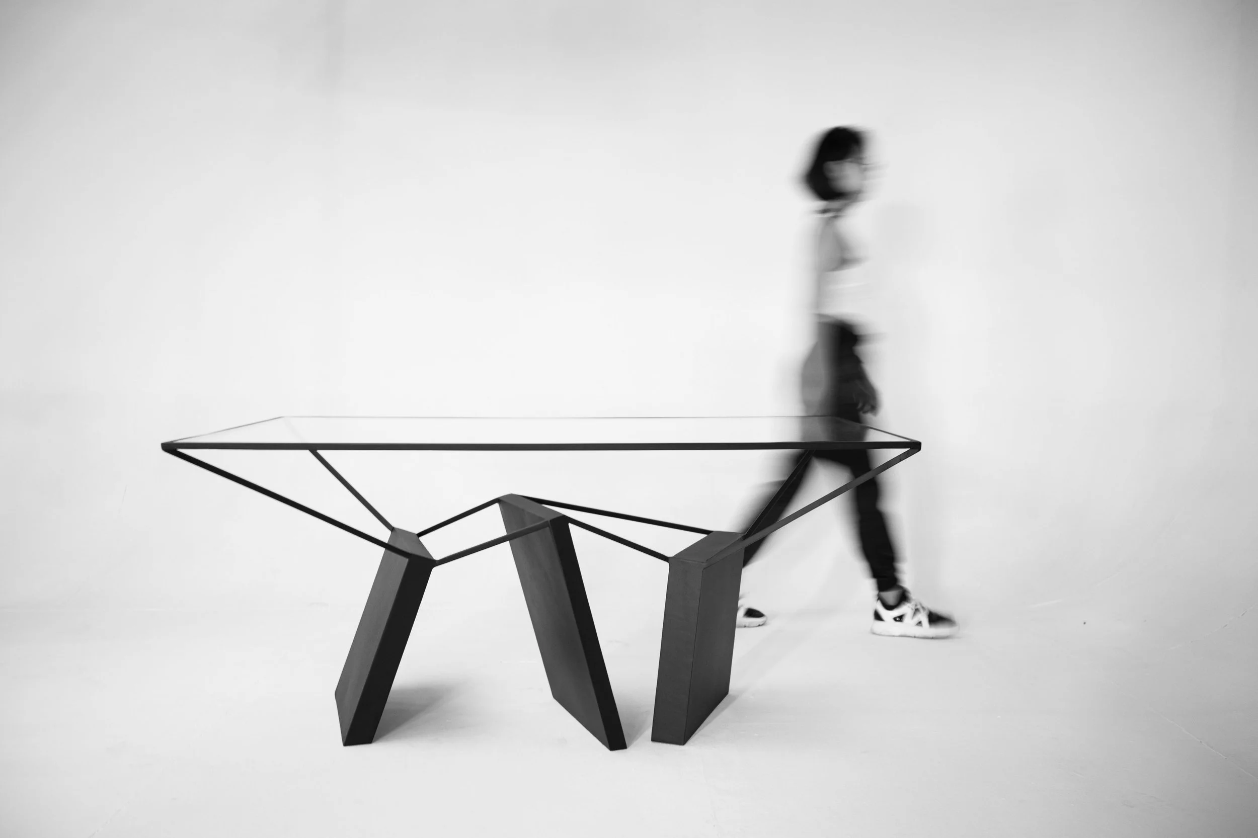 Sculptural steel dining table Ripple Effect by Nissa Kinzhalina — unique furniture Barcelona.