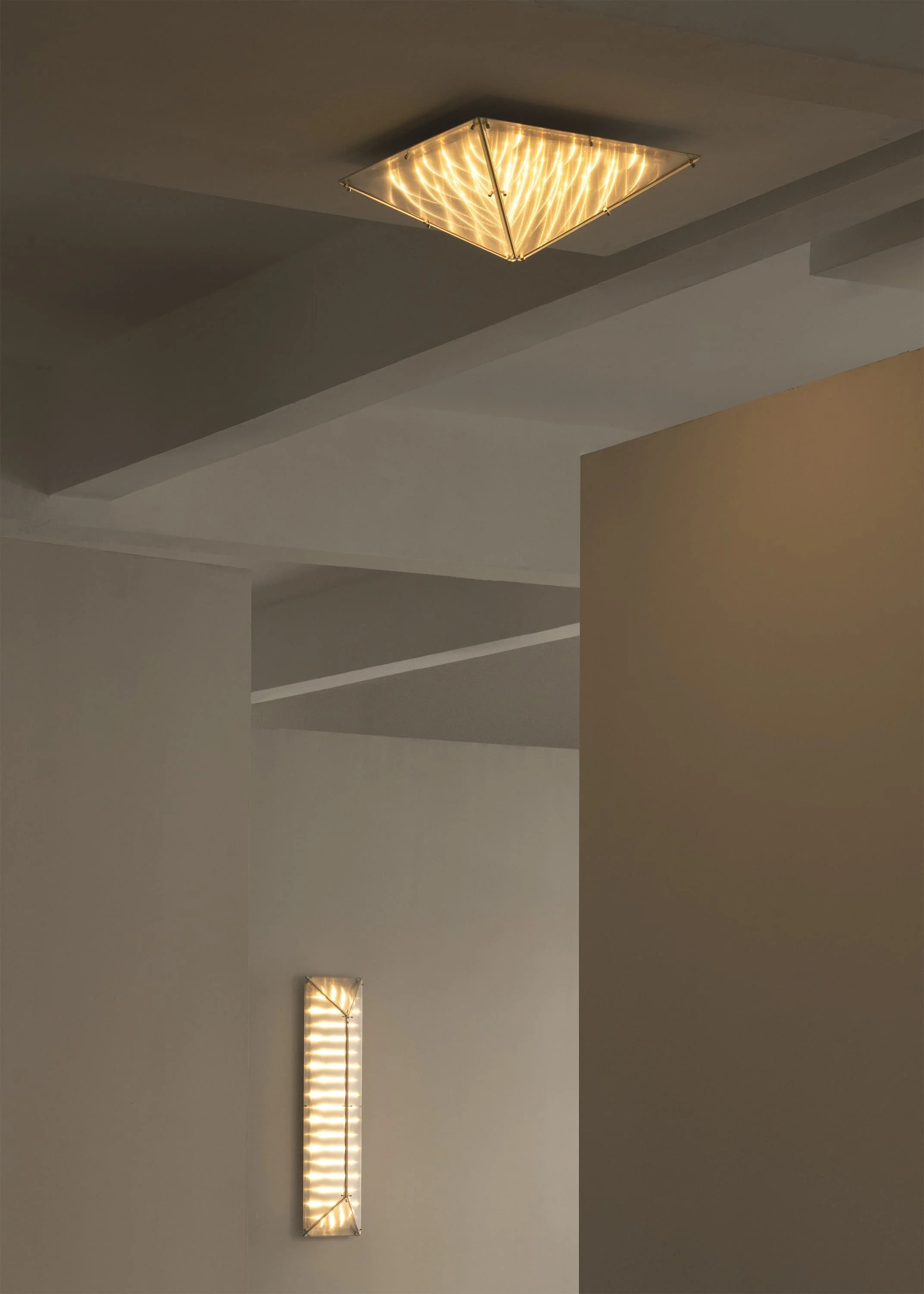 Modern collectible lighting design by Sing Chan with layered illumination.