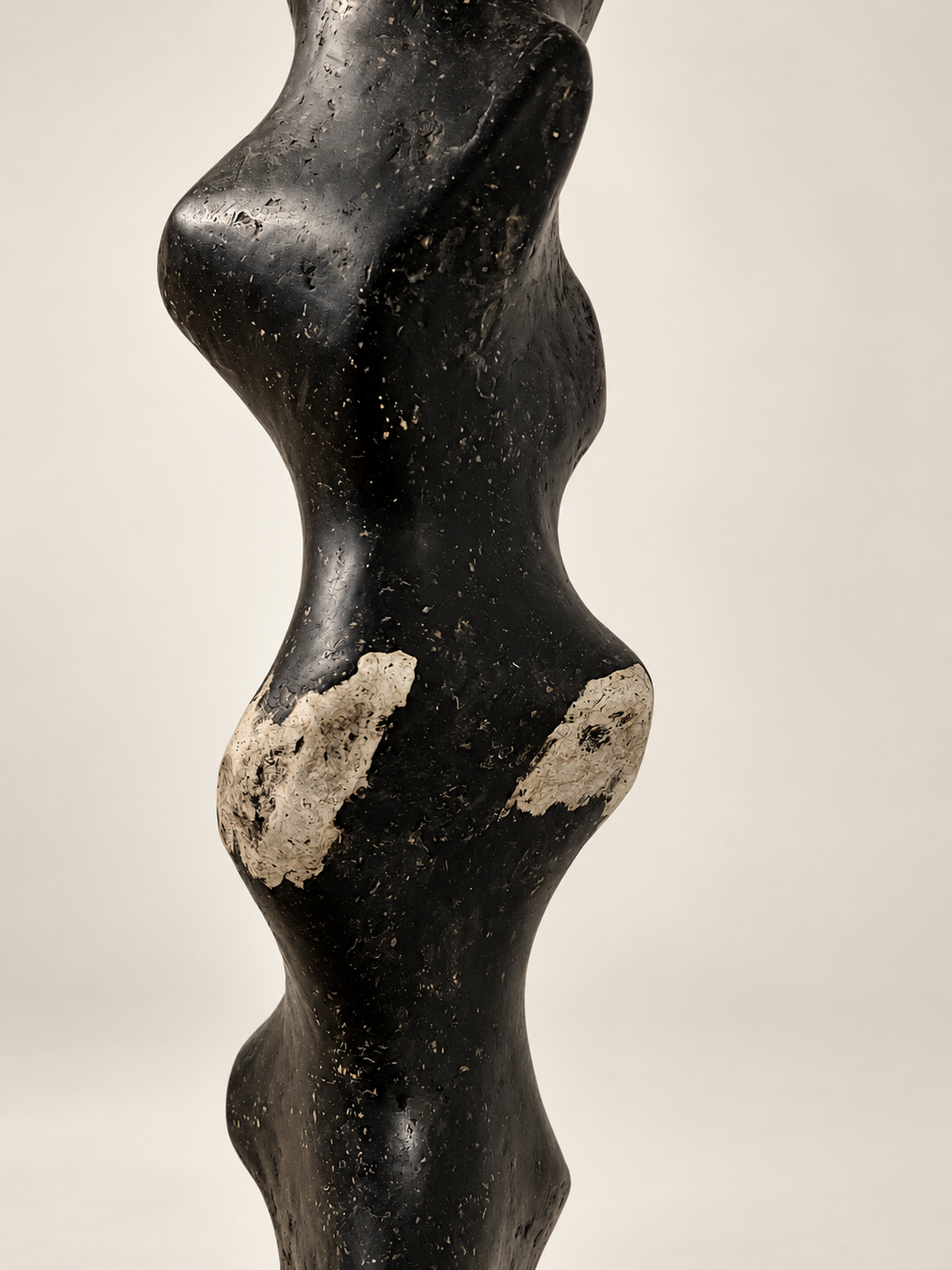 Close-up of Tótem III by Justino Del Casar showing organic curves and raw recycled paper texture