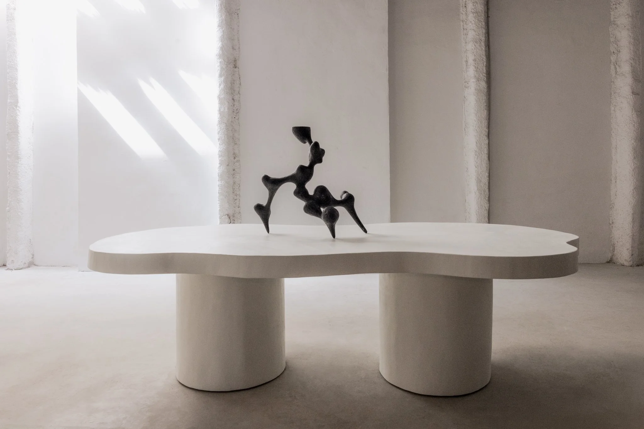 Curvae Table, cloud-shaped sculptural table by ITS A MOOD in neutral tones, contemporary design at BLANCONEGRO BARCELONA