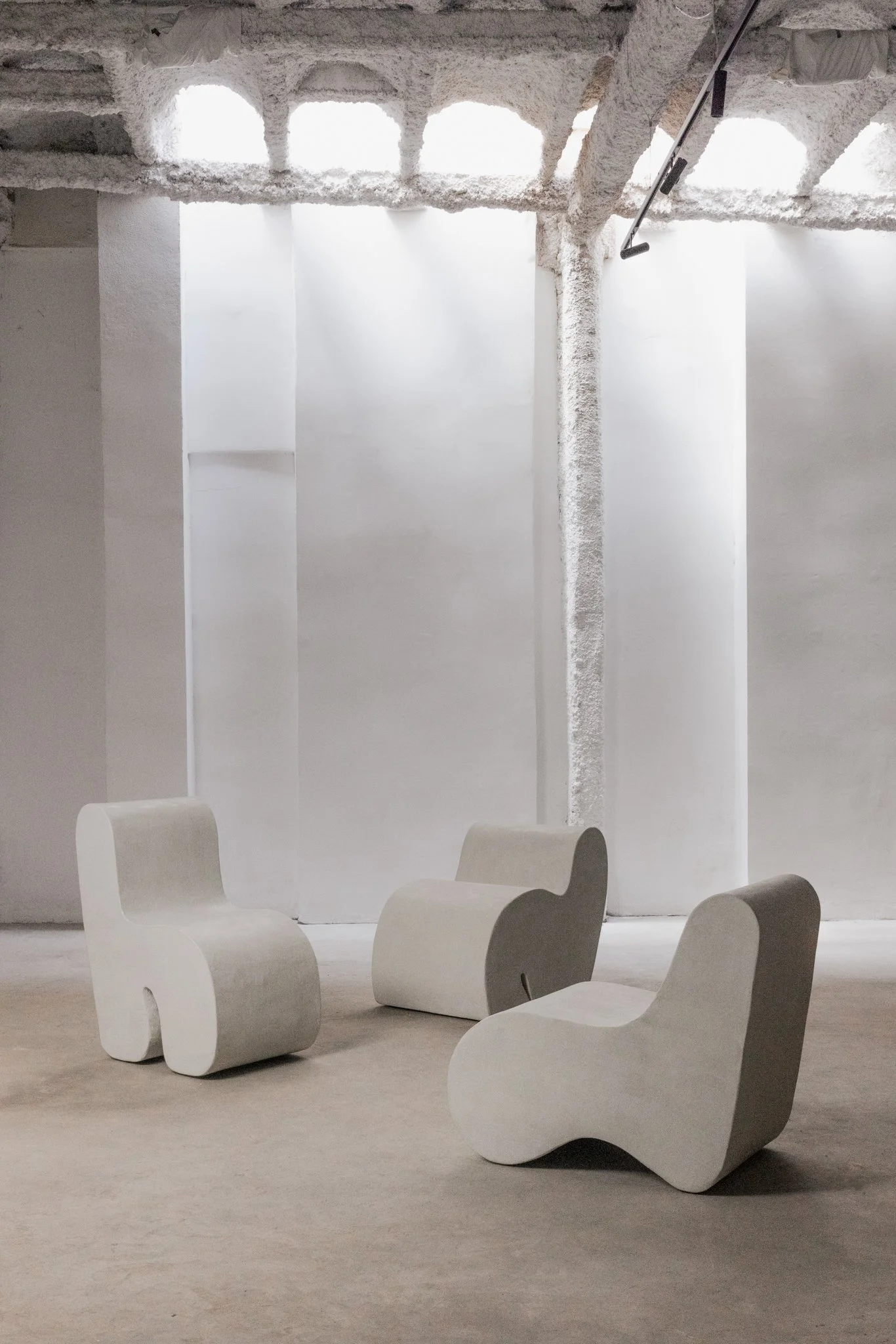 Nuage organic lounge chair by ITS A MOOD in matte white, monolithic collectible furniture, BLANCONEGRO BARCELONA
