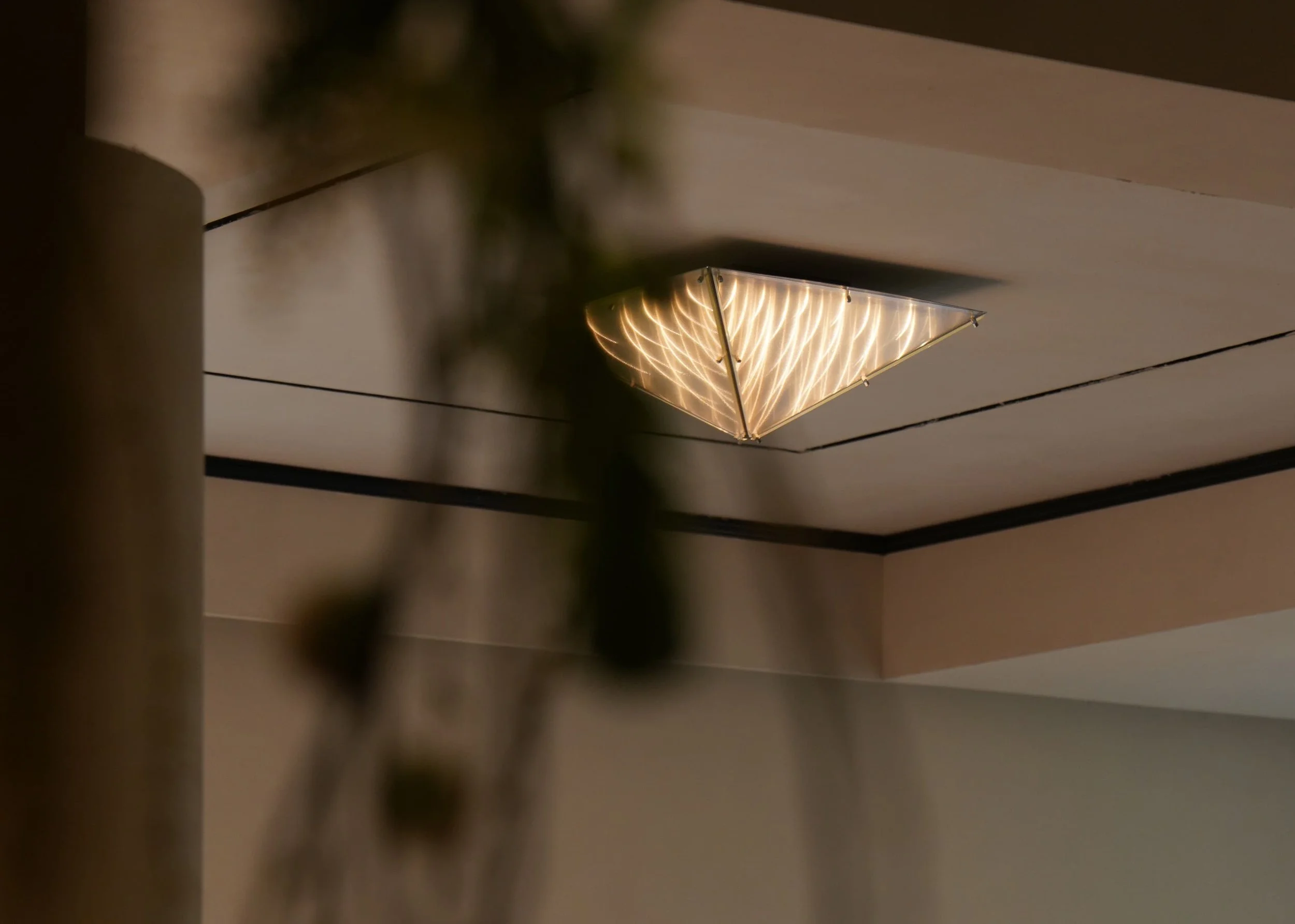 Sculptural lighting artwork by Sing Chan for contemporary interior spaces.