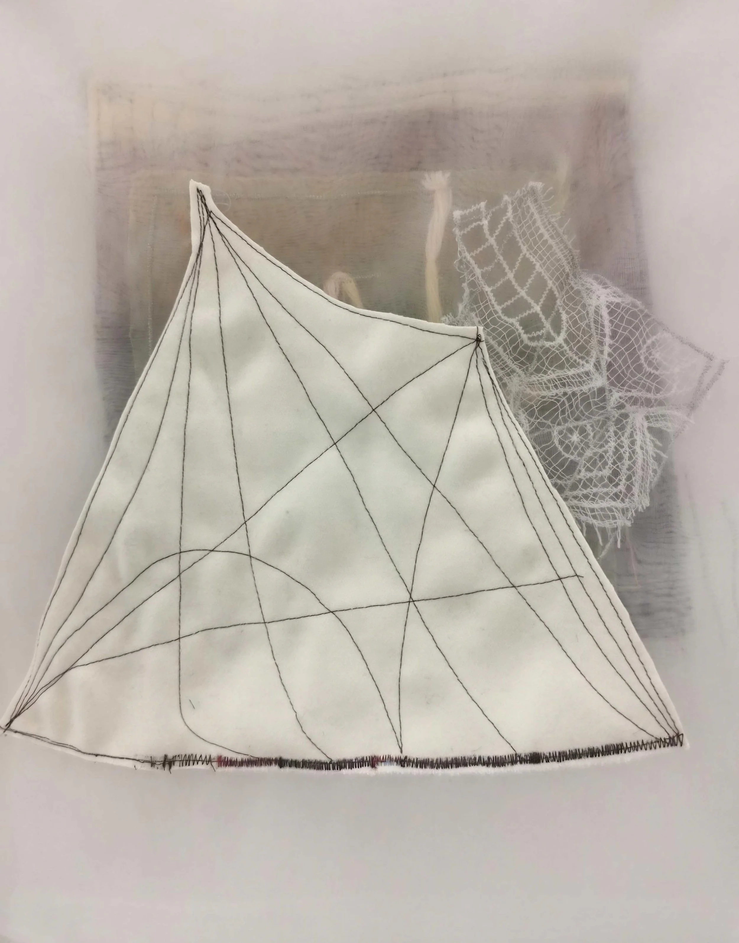 Modern fiber-based artwork with translucent textures and structural stitched patterns presented at EAST WEST SPACE’s contemporary textile exhibition