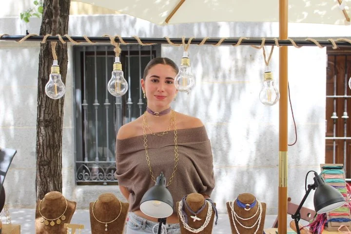 Lola Arenas, 2o years old, lives in Spain and runs a jewelry store/stand. 
Studying environmental science.