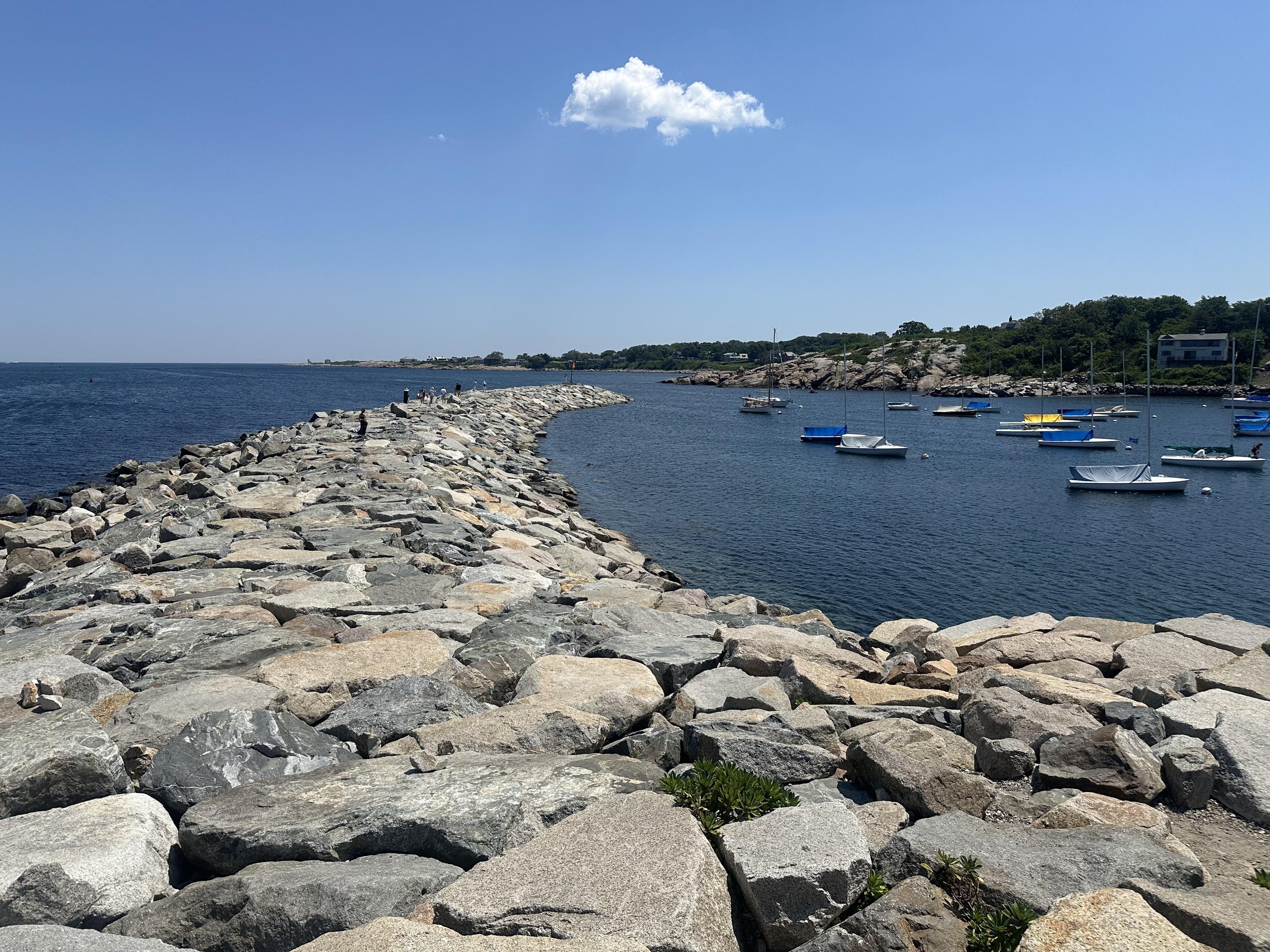 The stone breakwater jetty at the end of Bearskin Neck in Rockport, Massachusetts