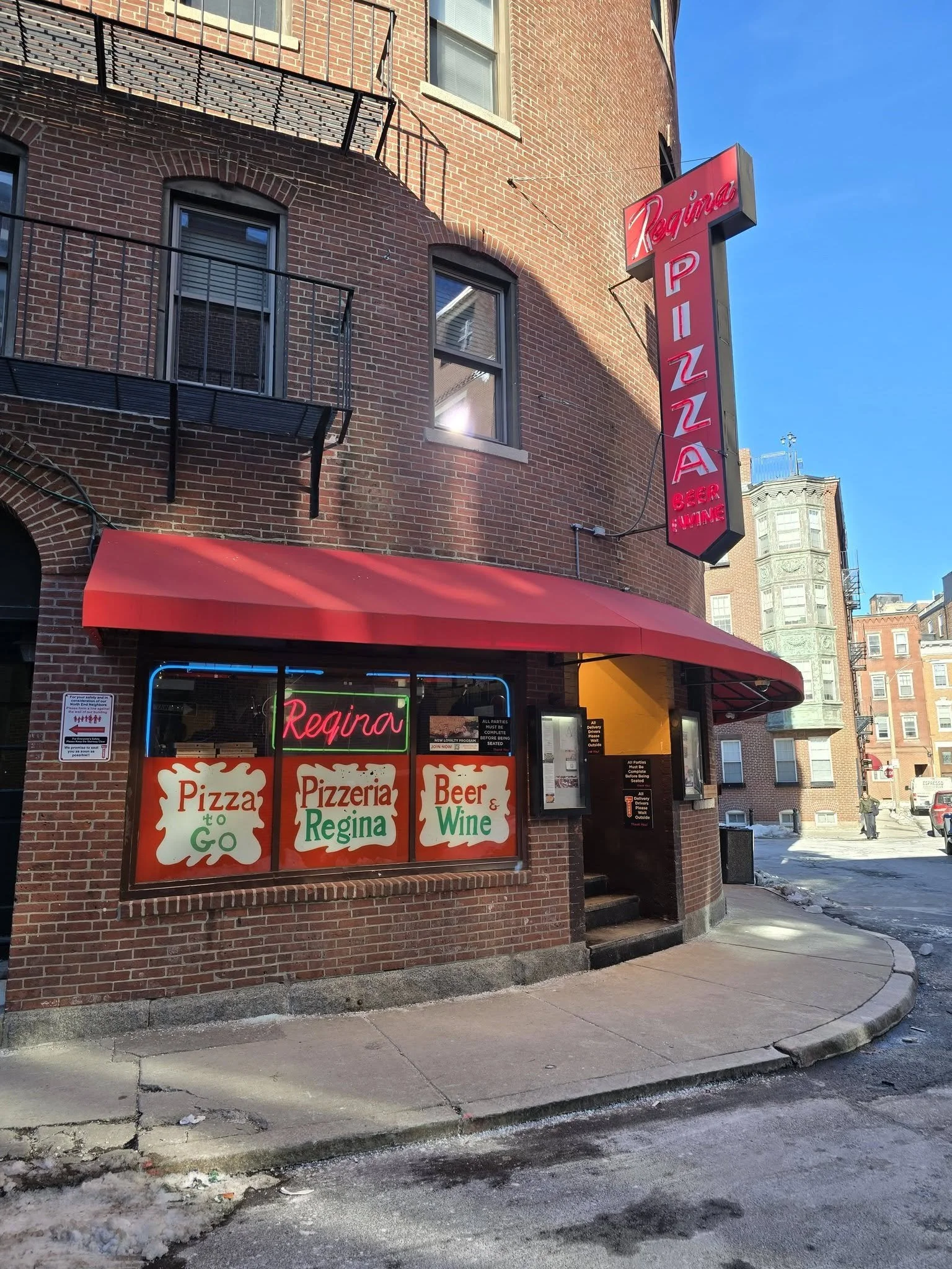 The historic Regina Pizzeria located at 11 ½ Thacher Street in Boston's North End
