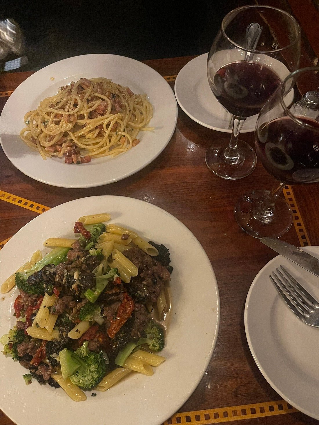Traditional Italian pasta dishes and red wine served at Lucia Ristorante located on Hanover Street in Boston's North End